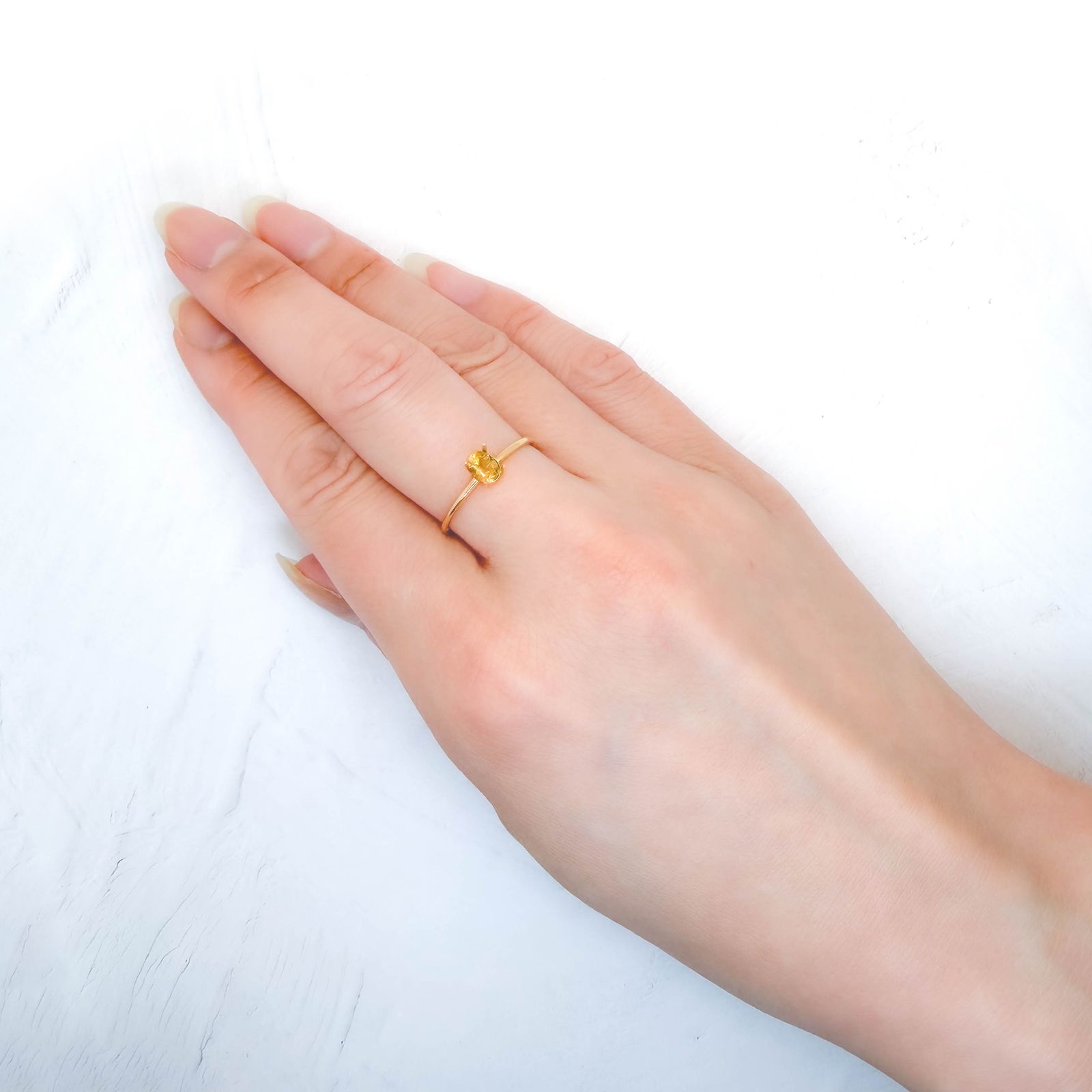 ゴールデンアイオライト(宝石名コーディエライト)マダガスカル産 識別済 0.23ct / 4.8x3.8mm前後 [260532199]
