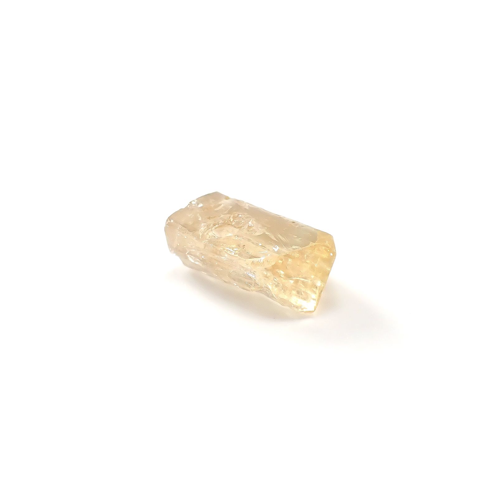 インペリアルトパーズ 原石 ザンビア産 6.06ct / 13x8.6mm前後 [250730939]