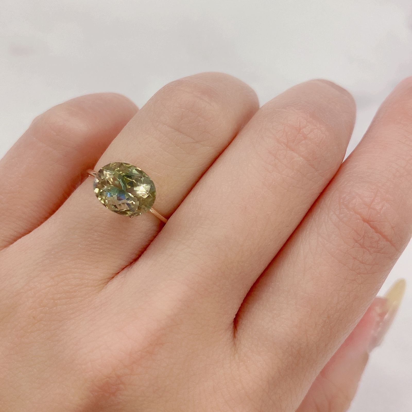 バイカラーオレゴンサンストーン(宝石名バイカラー・ラブラドライト) アメリカ・オレゴン州産 2.579ct ソ付(彩珠)[20106329]9.9×7.9mm前後