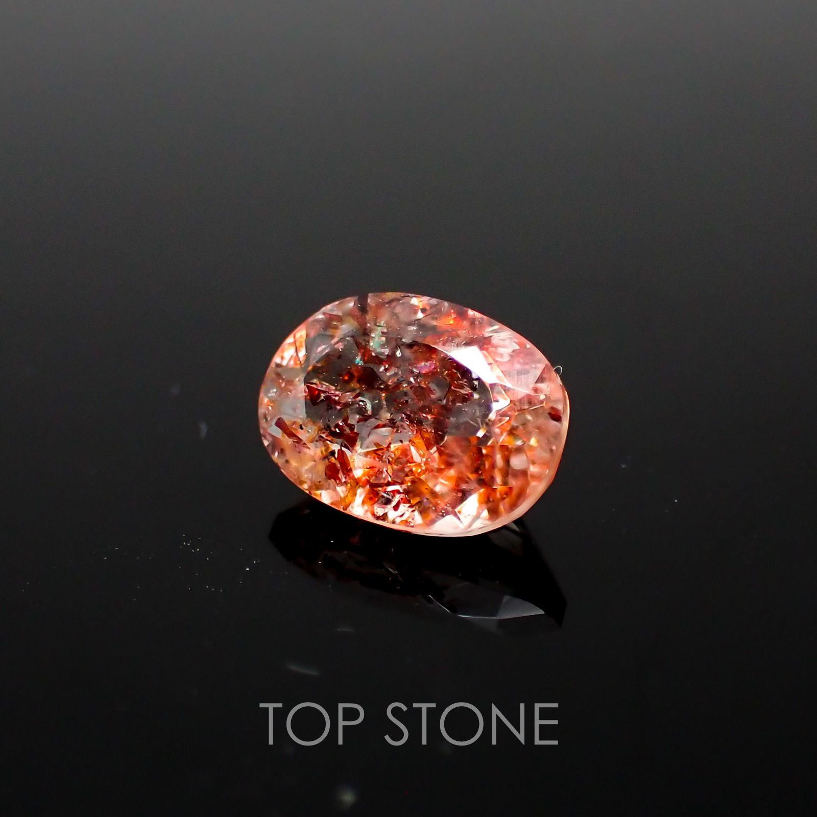 ファイヤークォーツ ナイジェリア産 ルース 1.41ct[210410202]8.7×6.3mm前後