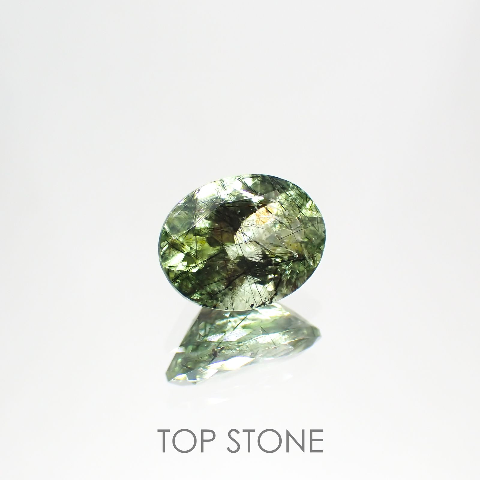 ルドウィジャイトインペリドット パキスタン産 ルース 1.36ct[210913494]7.9×6.1mm前後