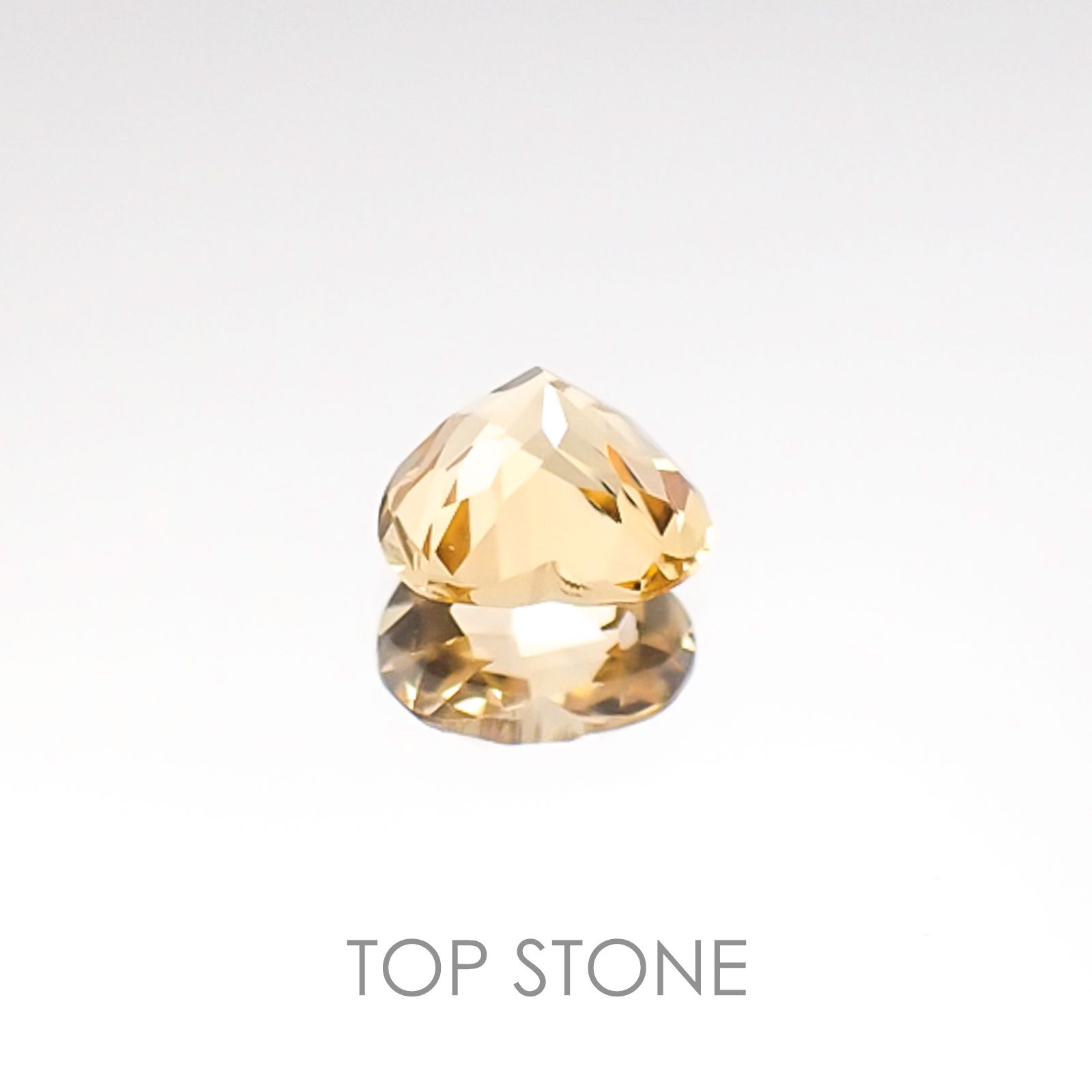 インペリアルトパーズ ブラジル産 ルース 0.5ct[20106514]5.2×4.9mm前後