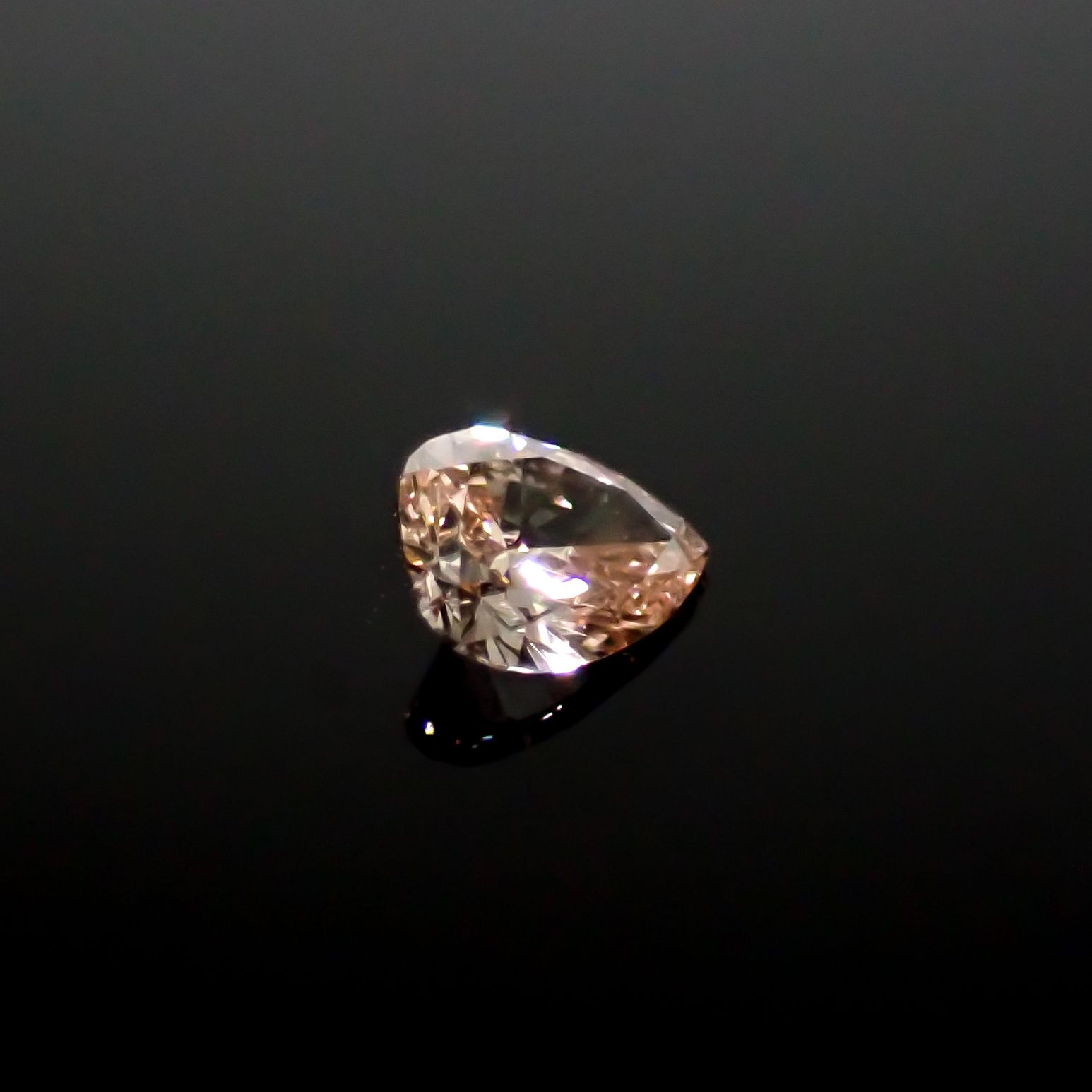 ピンクダイヤモンド(宝石名ダイアモンド SI-1/FANCY BROWNISH ORANGY PINK) 0.097ct ソ付(CGL)[240928974]3.6x2.81mm前後