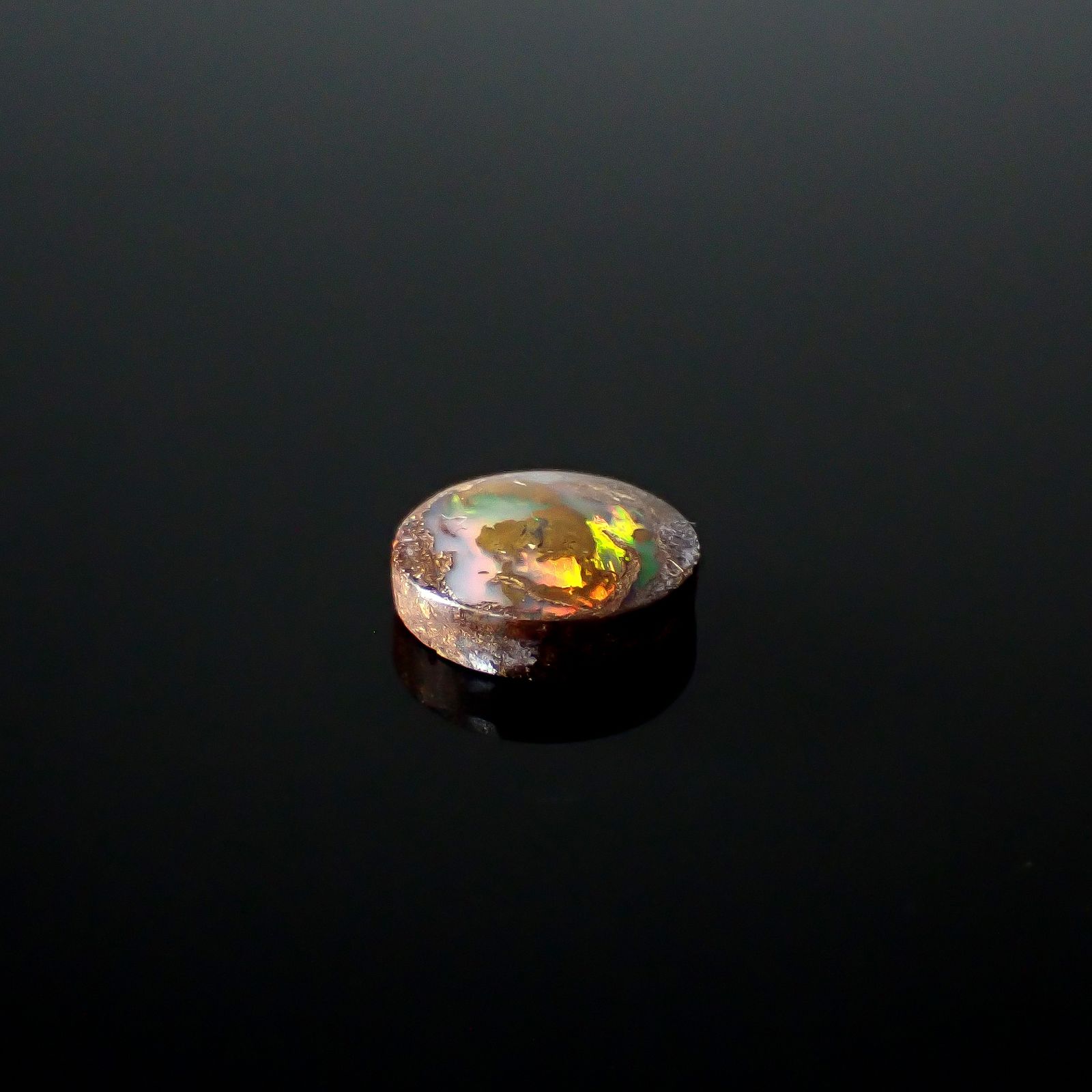 ウッドオパール オーストラリア産 0.94ct / 7.6x7.6mm前後 [251031194]