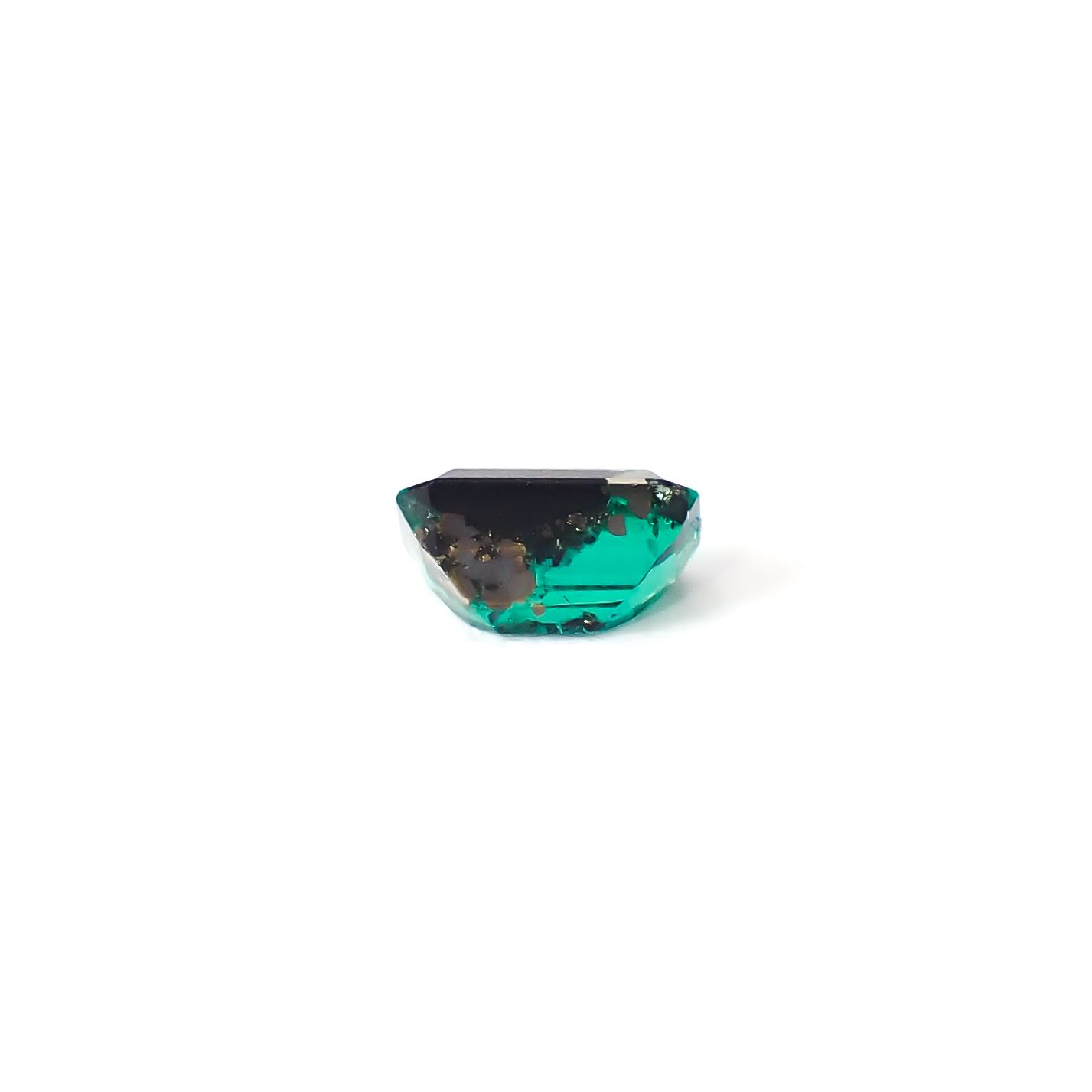パイライトインエメラルド コロンビア産 0.75ct / 6.5x4.5mm前後 [260532119]