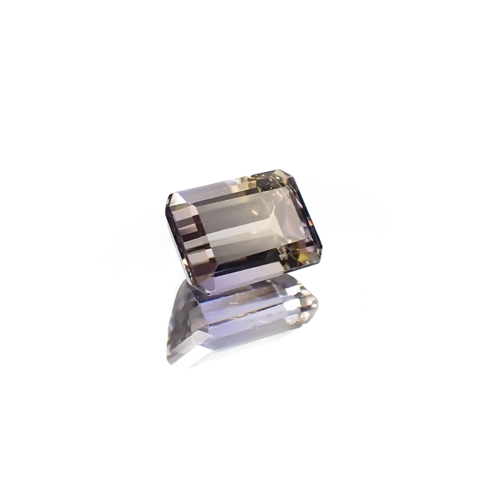 バイカラータンザナイト(宝石名バイカラー・ゾイサイト) タンザニア産 ソ付(彩珠) 0.887ct / 5.9x4.3mm前後 [210711582]