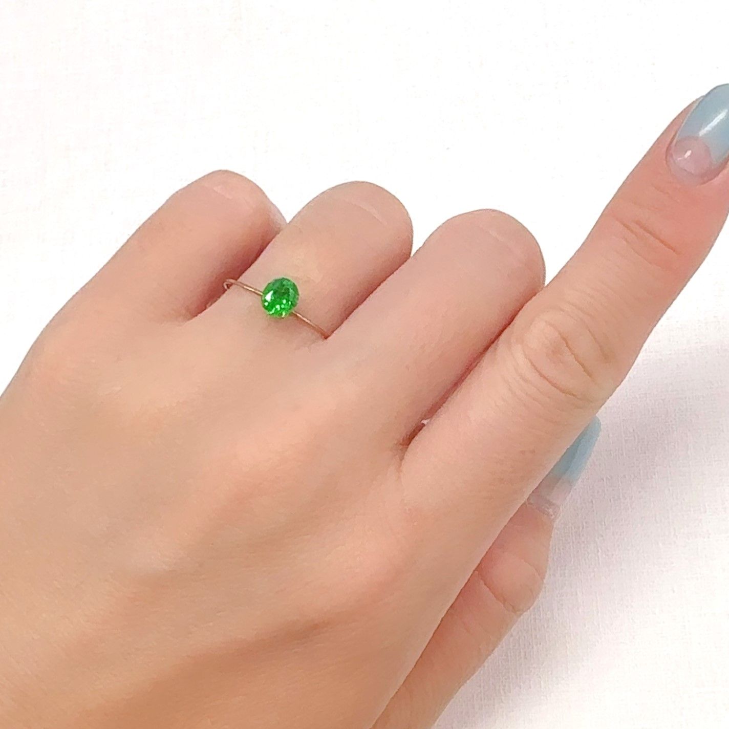 パライバトルマリン(宝石名トルマリン/別名パライバ・トルマリン)ブラジル・キントス鉱山産 0.578ct ソ付(宝貴協)[240928715]5.87x4.98mm前後