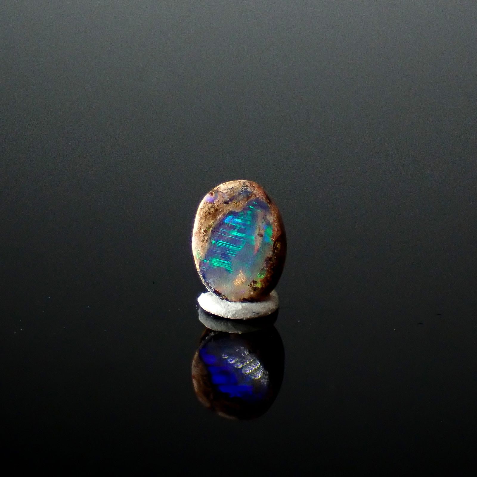 ウッドオパール オーストラリア産 0.24ct / 4.8x3.6mm前後 [251031199]
