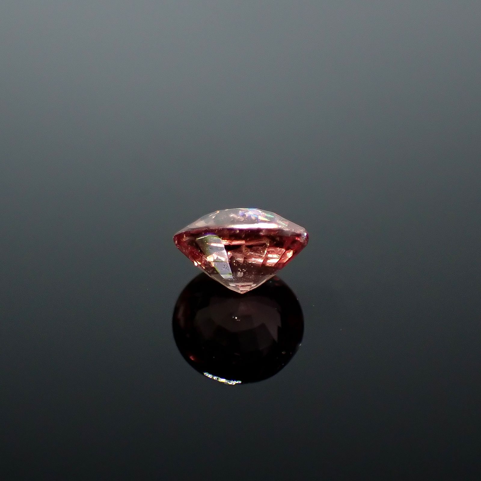 パパラチャサファイア(宝石名サファイア/別名パパラチャ・サファイア)スリランカ/マダガスカル産 DGL鑑付 0.553ct / 4.86x4.93mm前後 [251031289]