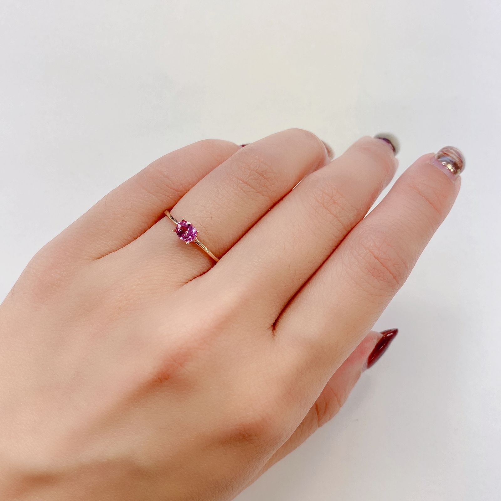 パパラチャサファイア(宝石名サファイア/別名パパラチャ・サファイア) スリランカ産 0.412ct DGL鑑付[21019430]4.9×4mm前後