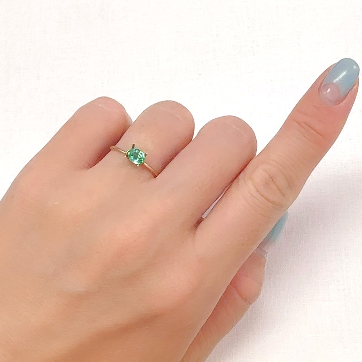 パライバトルマリン(宝石名トルマリン/別名パライバ・トルマリン)ブラジル・キントス鉱山産 0.485ct ソ付(宝貴協)[240928717]5.16x4.16mm前後