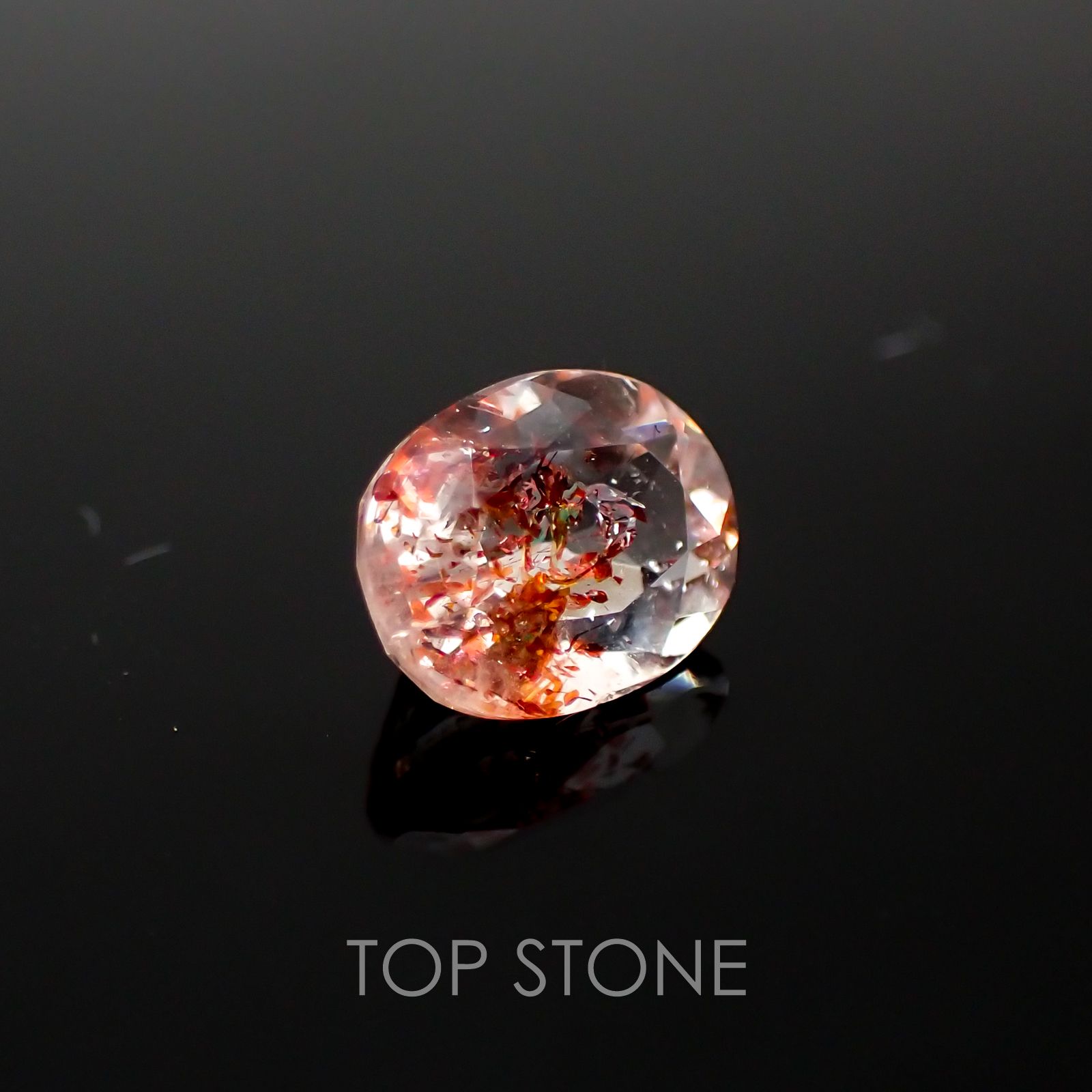 ファイヤークォーツ ナイジェリア産 ルース 1.41ct[210410207]7.9×6.5mm前後