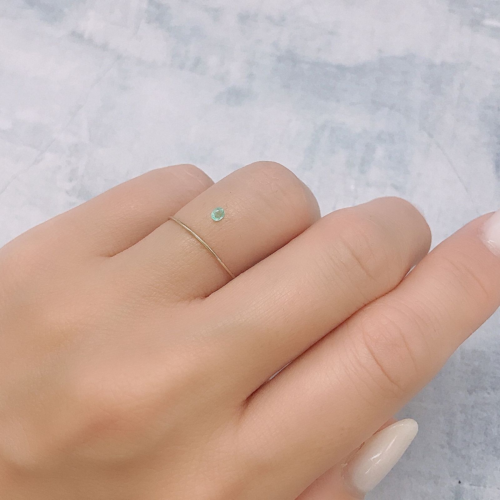 パライバトルマリン(宝石名トルマリン/別名パライバ・トルマリン)ブラジル・パライバ州バターリャ鉱山産 0.051ct 識別済[220616590]2.5x2.1mm前後