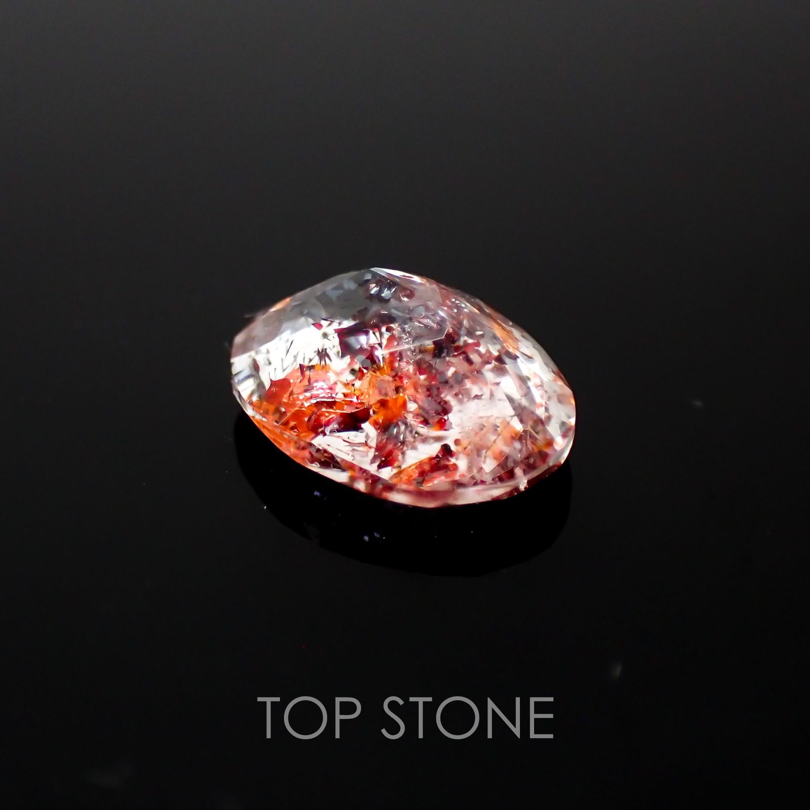 ファイヤークォーツ ナイジェリア産 ルース 1.47ct[210410204]9.1×6.9mm前後