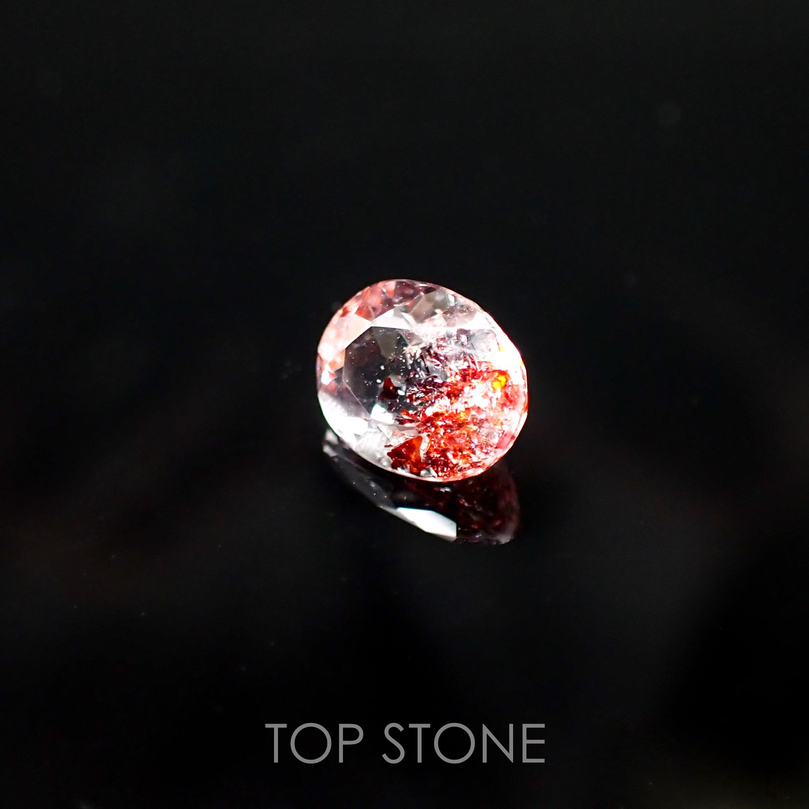 ファイヤークォーツ ナイジェリア産 ルース 1.11ct[210510708]7.5×6mm前後