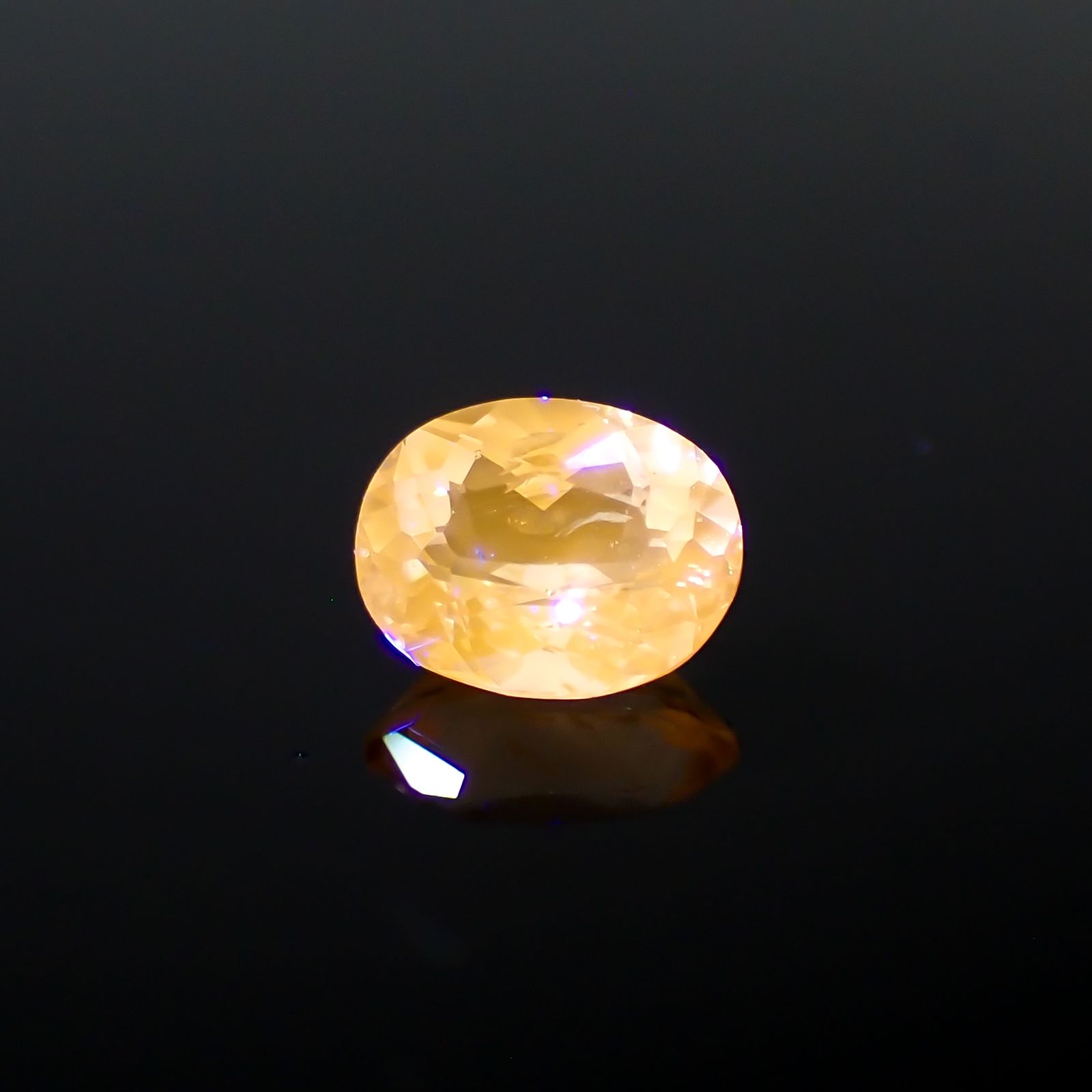 マリアライト フルオレッセンス(宝石名スキャポライト)スリランカ産 0.65ct 識別済[230421675]6.5x5mm前後