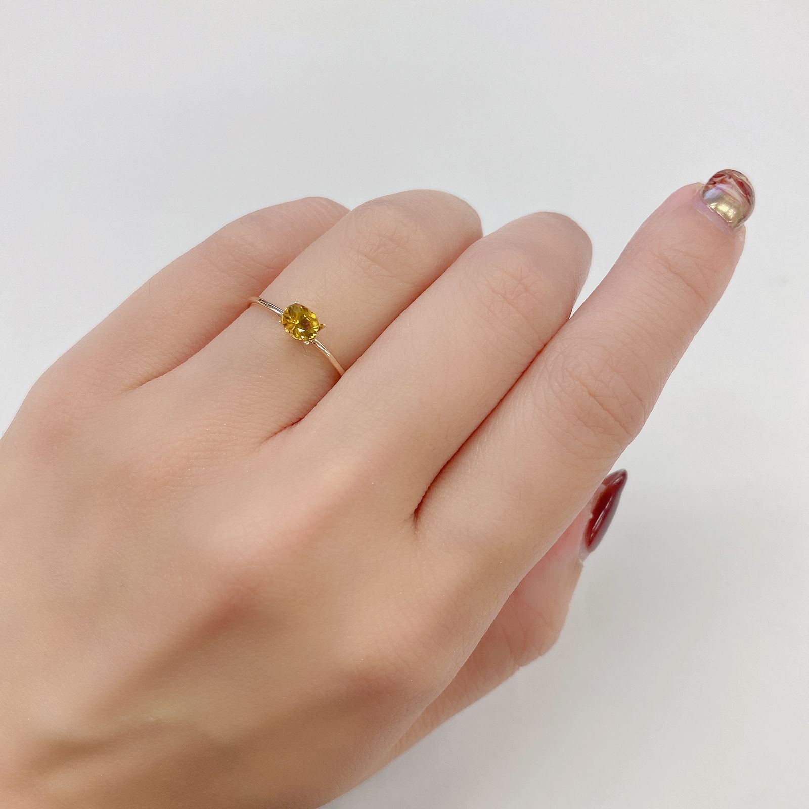 クリノヒューマイト(宝石名クリノヒューマイト) パキスタン産 0.376ct ソ付(CGL)[21059603]4.9×4mm前後