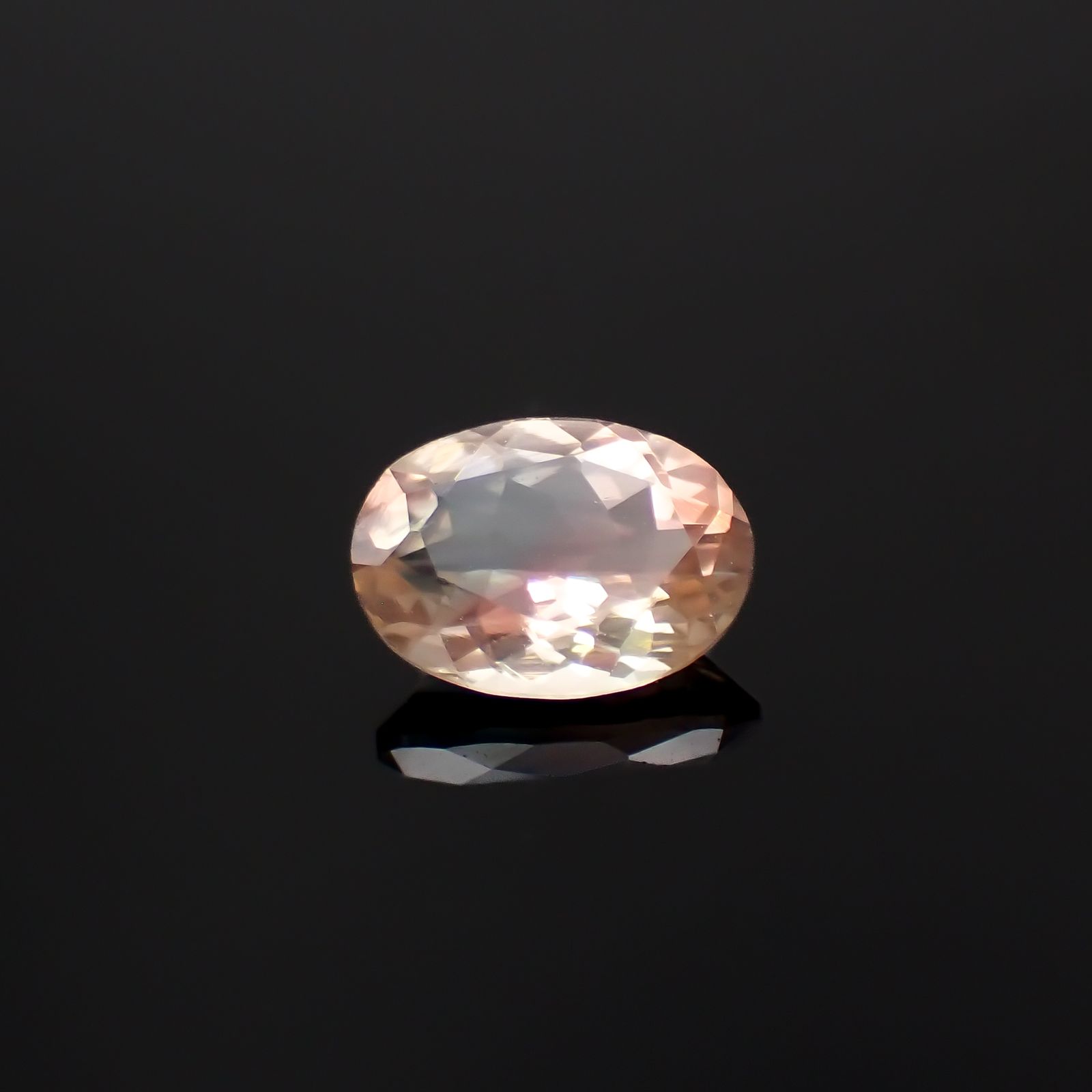 パーティカラーオレゴンサンストーン アメリカ・オレゴン州産 0.93ct[230722847]7.8x5.7mm前後
