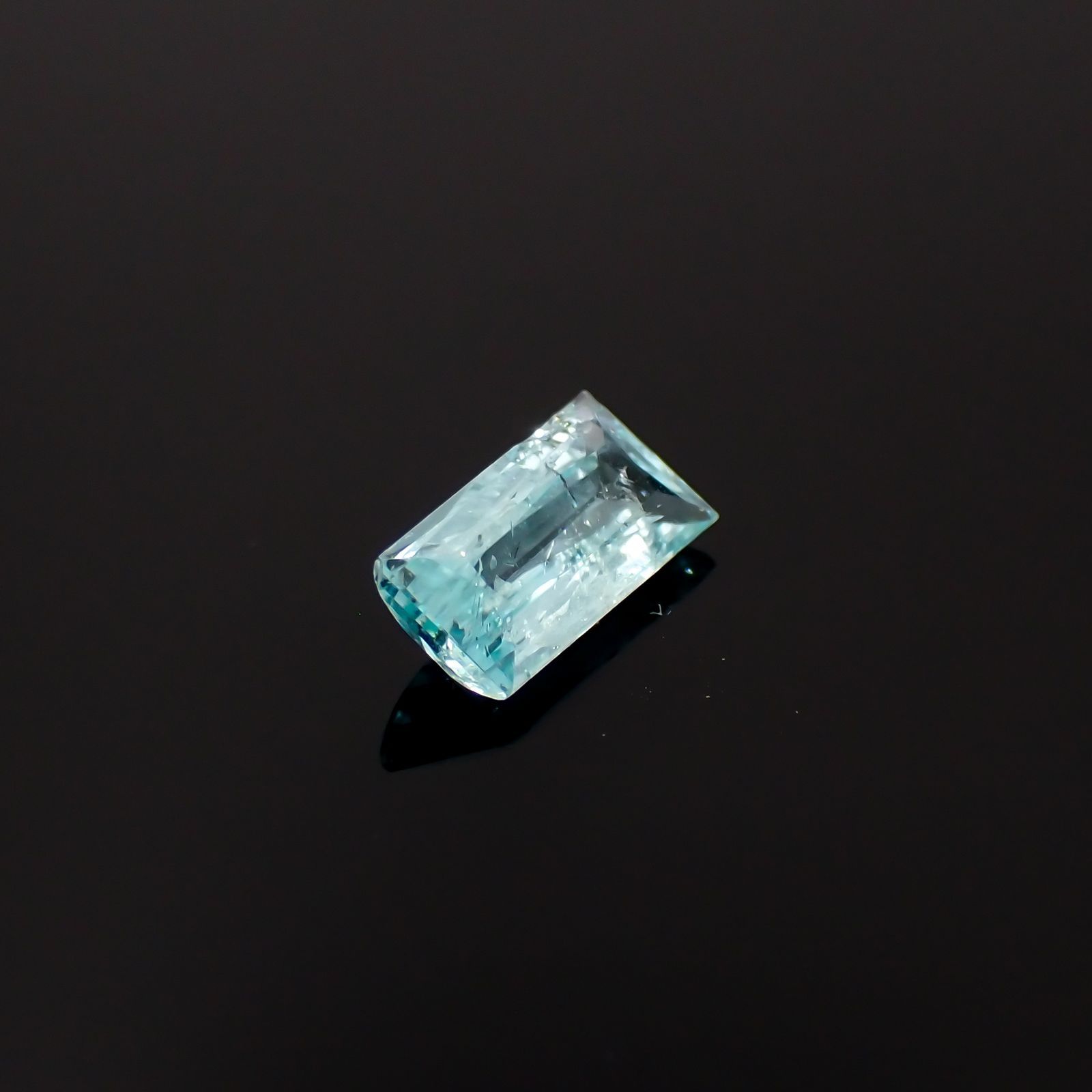 パライバトルマリン(宝石名トルマリン/別名パライバ・トルマリン)モザンビーク産 識別済 0.77ct / 8.1x4mm前後 [230522239]
