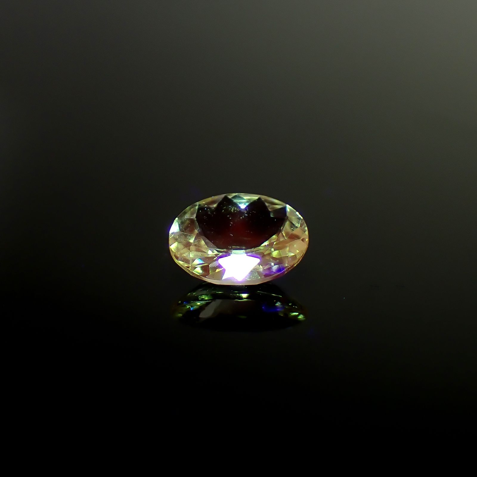 ミントガーネット タンザニア産 0.41ct / 5.5x4.3mm前後 [260932677]