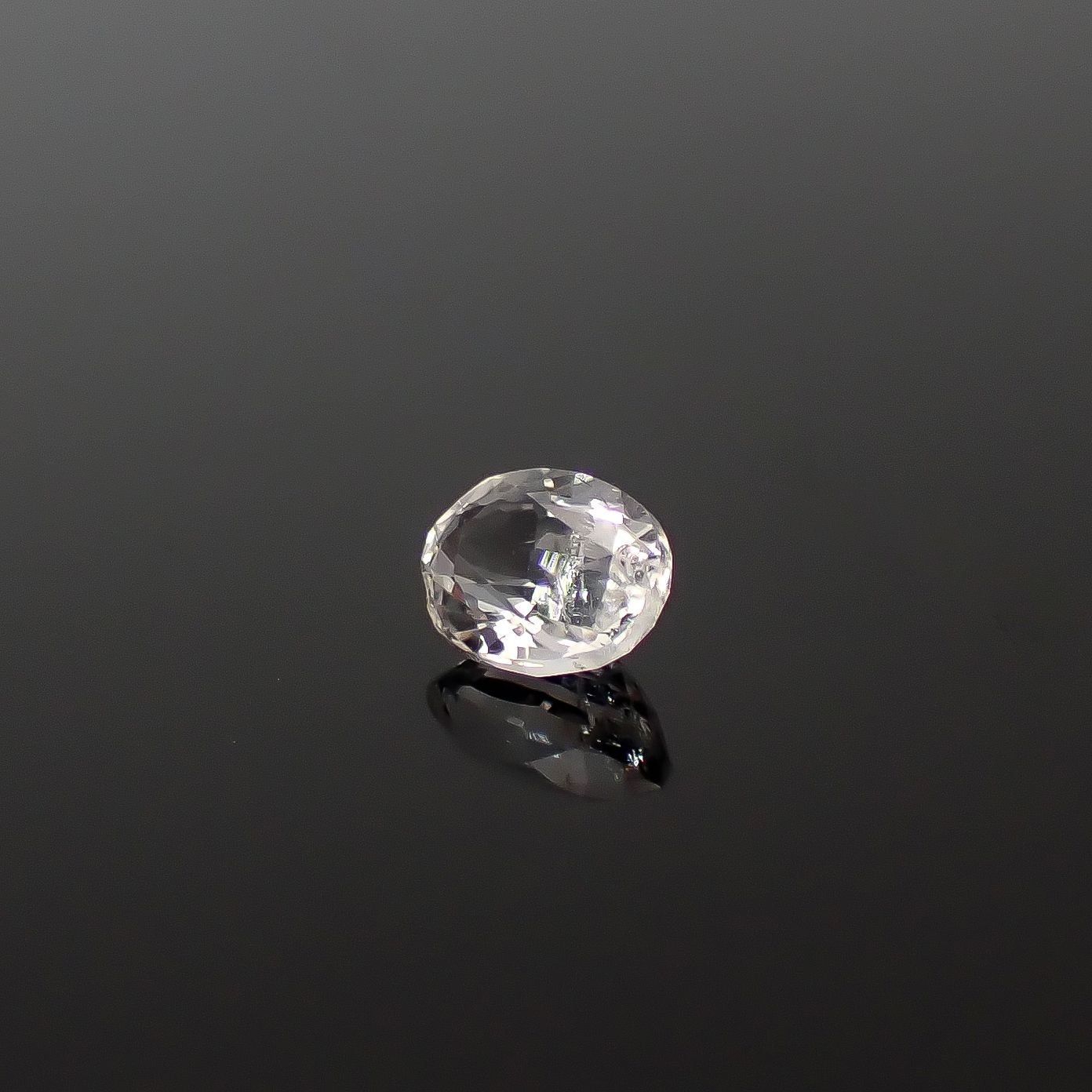 テネブレッセンススキャポライト アフガニスタン産 0.25ct / 4.7x3.6mm前後 [260432044]