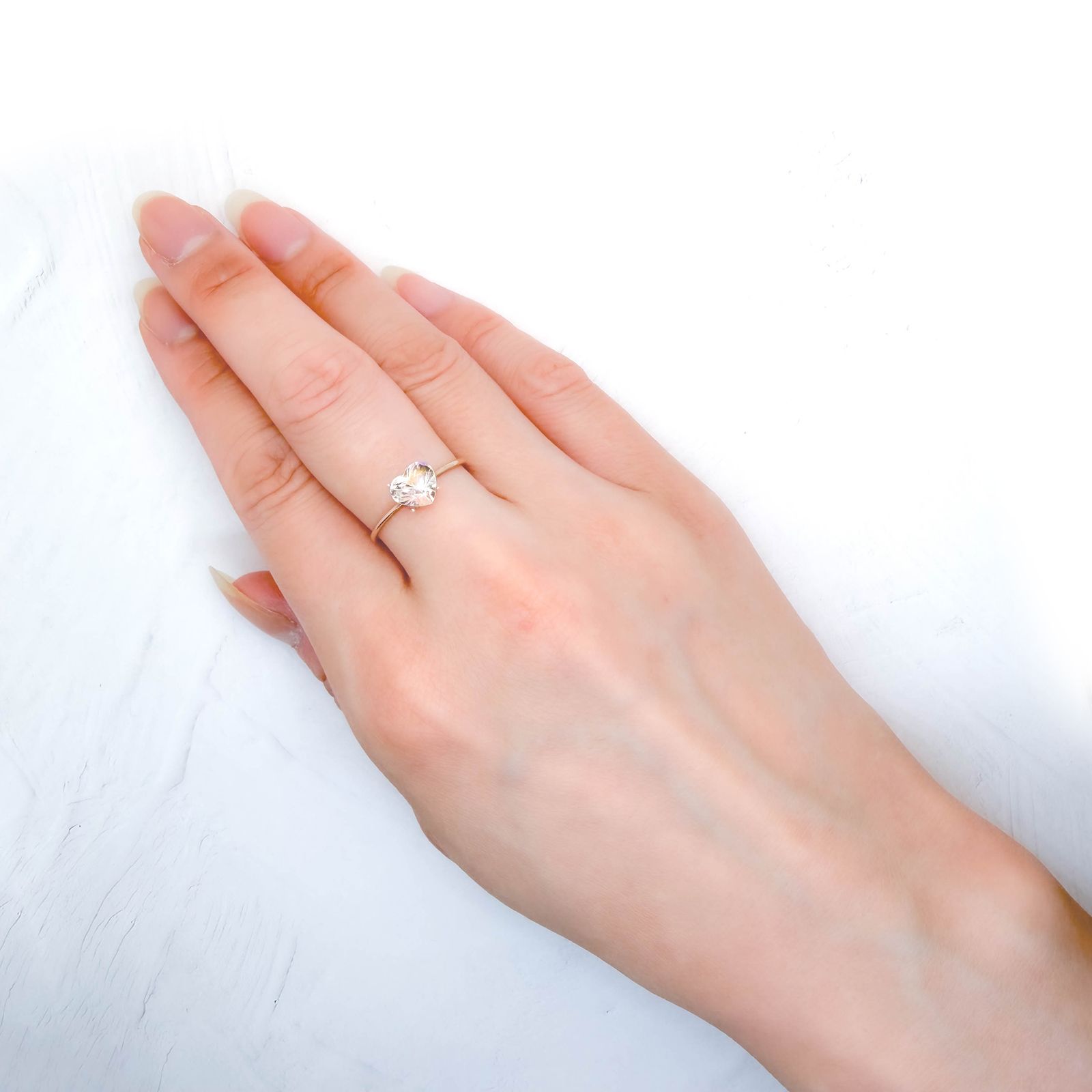 レインボームーンストーン マダガスカル産 1.20ct / 6.4x6.9mm前後 [260632373]