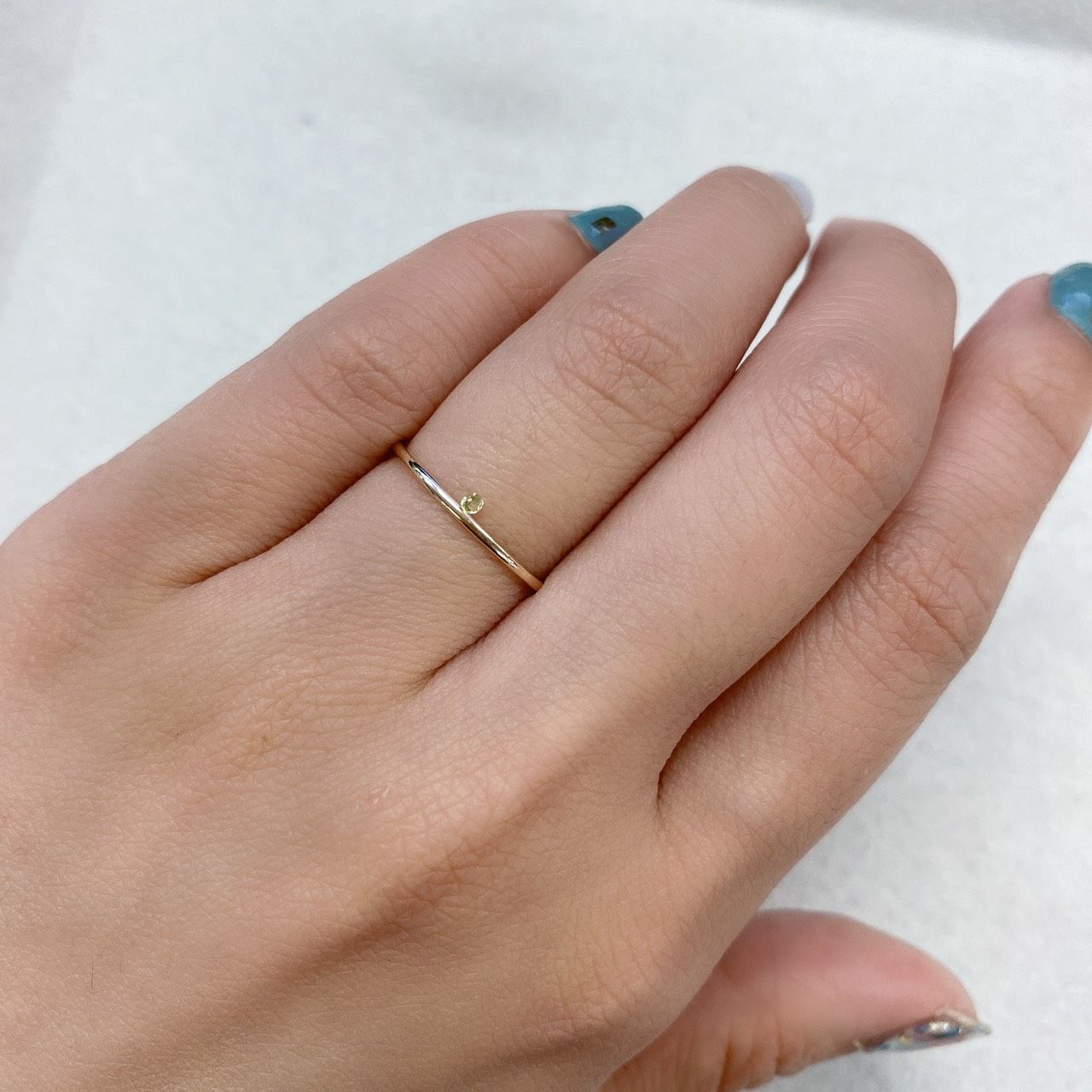 パラサイティックペリドット(宝石名ペリドット) 採取地：ロシア 0.018ct 識別済[210812865]1.5×1.5mm前後