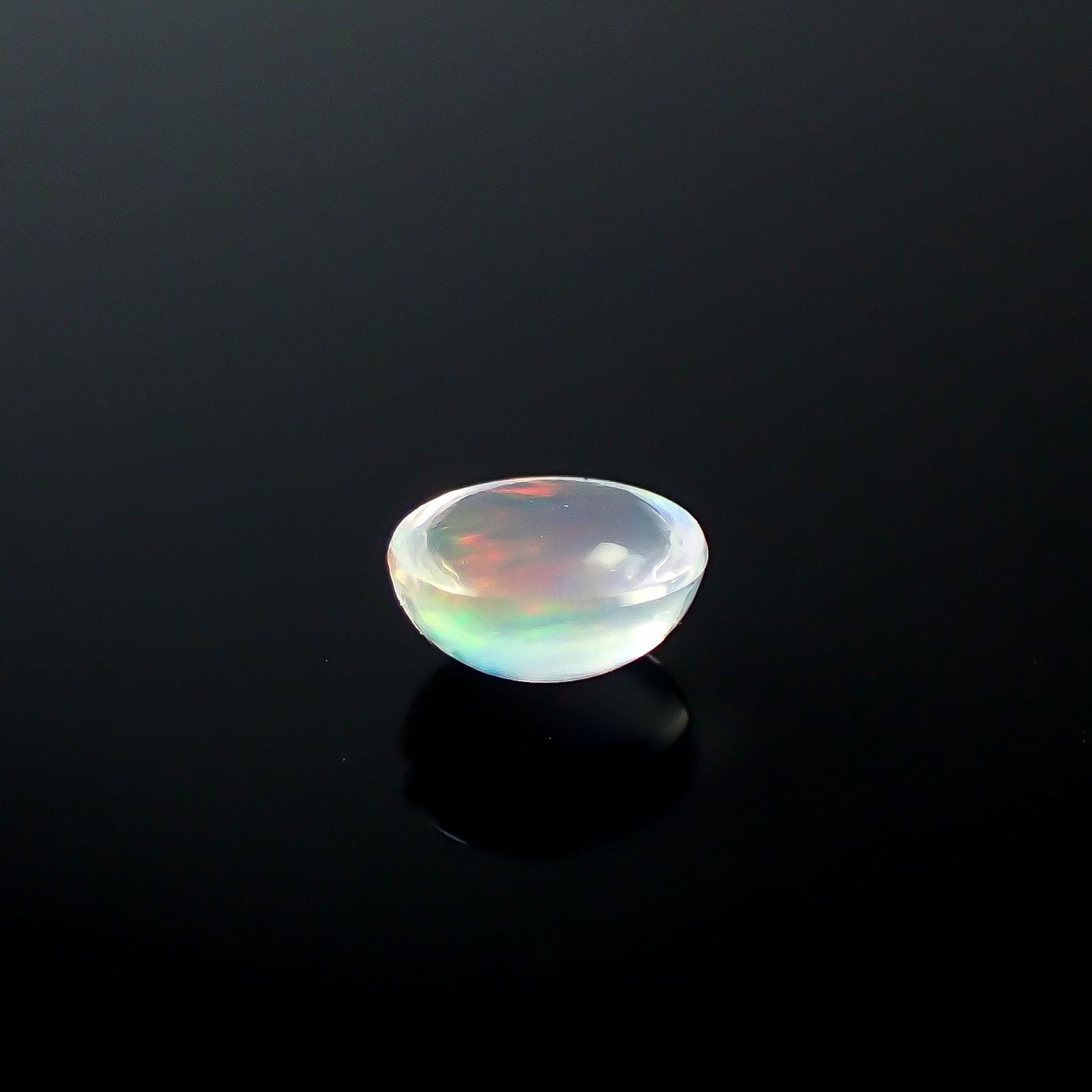 ウォーターオパール メキシコ産 0.49ct / 6x5.4mm前後 [250931004]