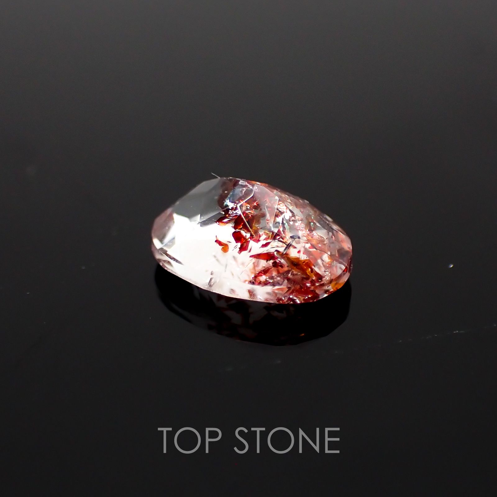 ファイヤークォーツ ナイジェリア産 ルース 1.41ct[210410202]8.7×6.3mm前後