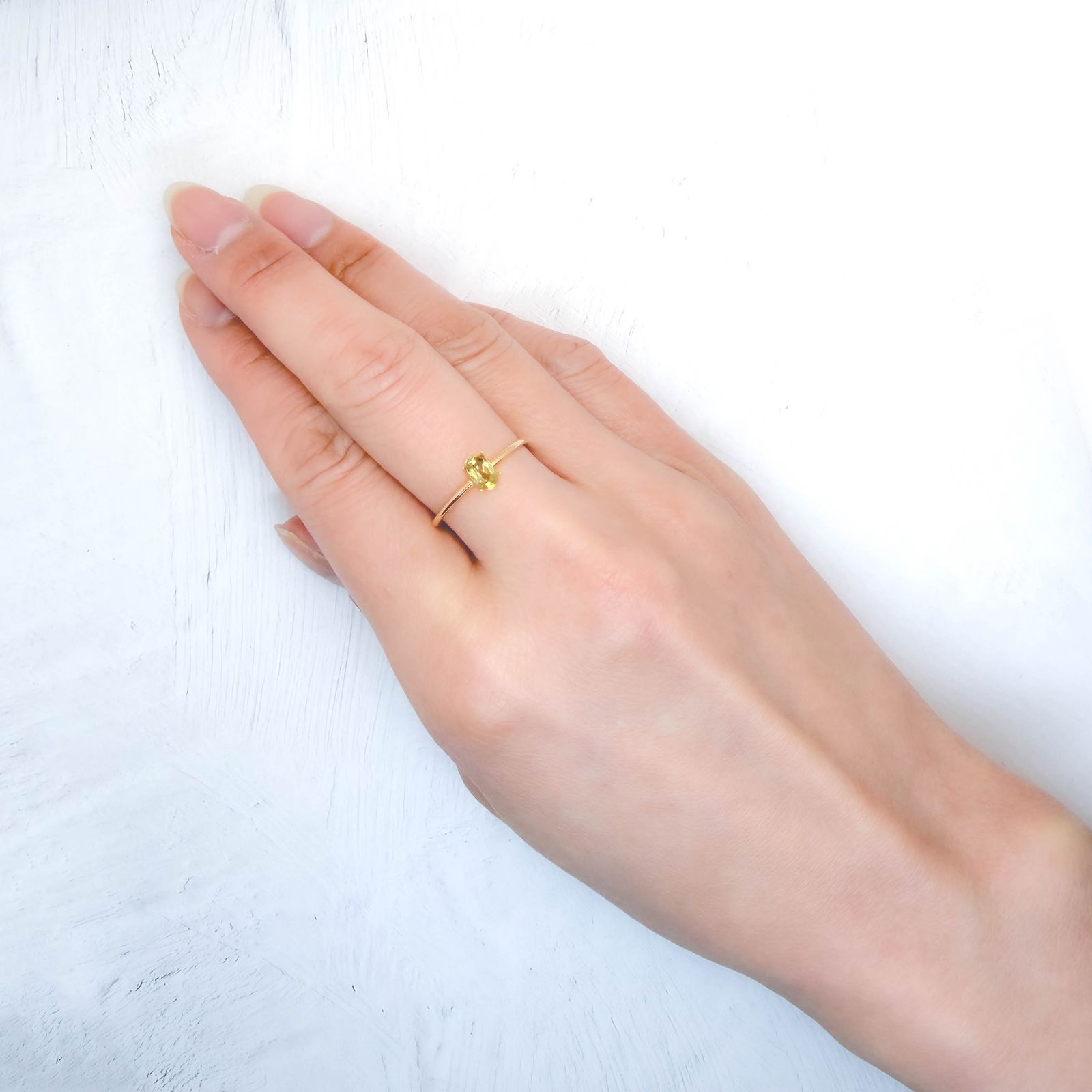 コンドロダイト(宝石名コンドロダイト)タジキスタン・パミール高原産 識別済 0.39ct / 5.5x3.6mm前後 [260131587]