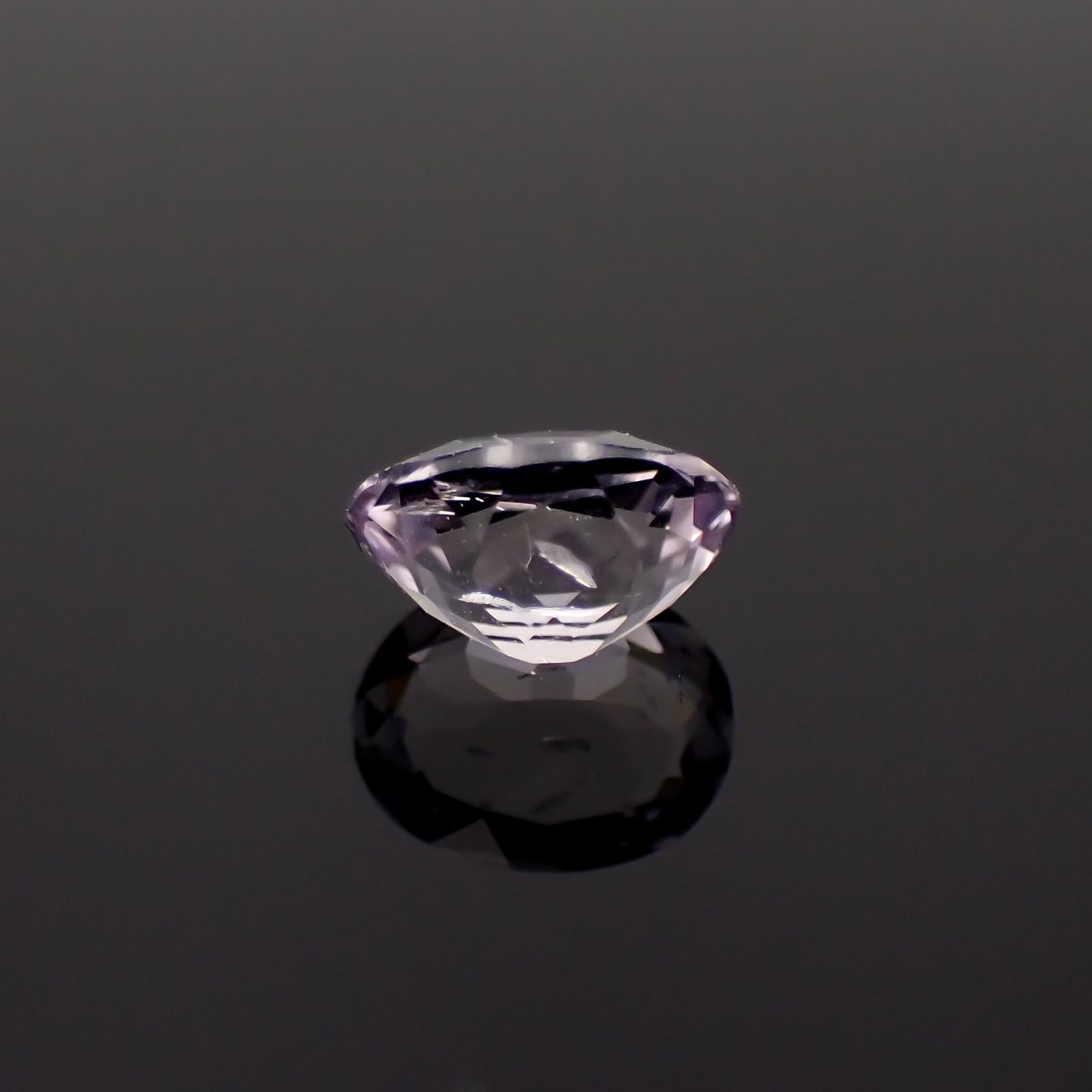 マリアライト フルオレッセンス(宝石名スキャポライト)スリランカ産 0.65ct 識別済[230421675]6.5x5mm前後