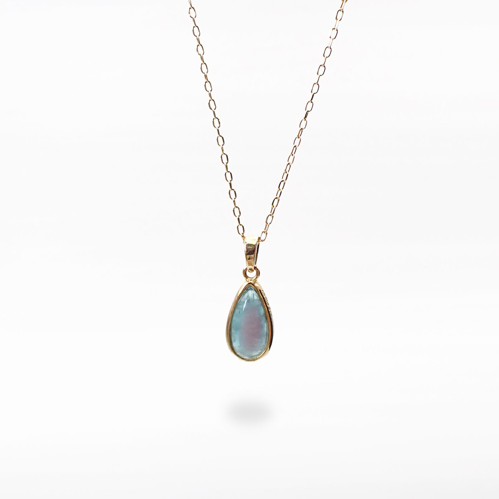 ◇K18ペンダント◇ バイカラーパライバトルマリン ブラジル・バターリャ鉱山産 0.60ct | 手巻き枠 つやあり 5.4x9mm(※チェーン別売り) [241229431]
