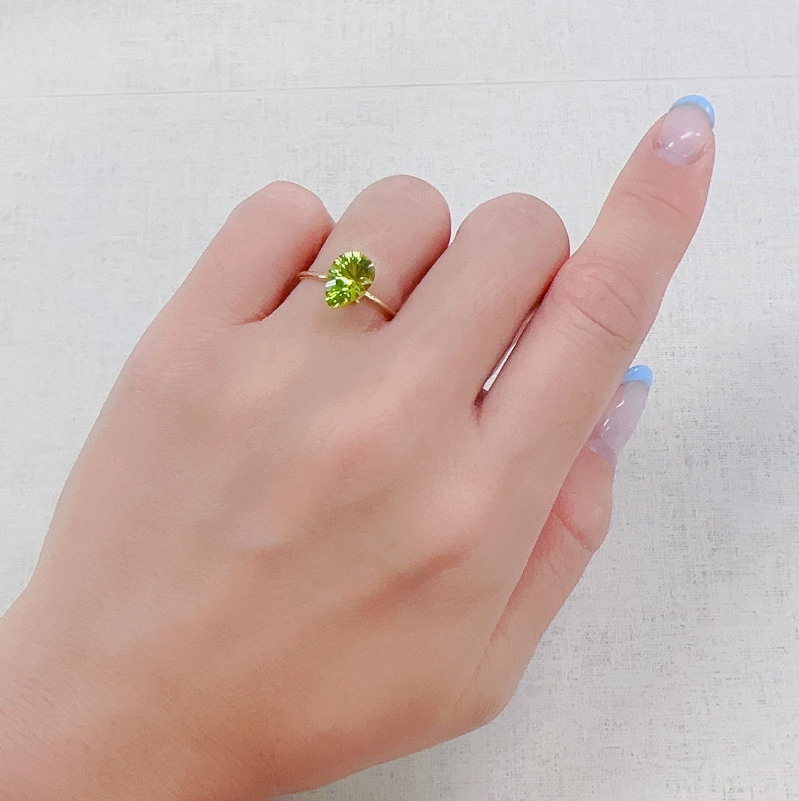 ◇コンケーブカット◇ペリドット 中国産 1.91ct[230622296]9.9x6.9mm前後