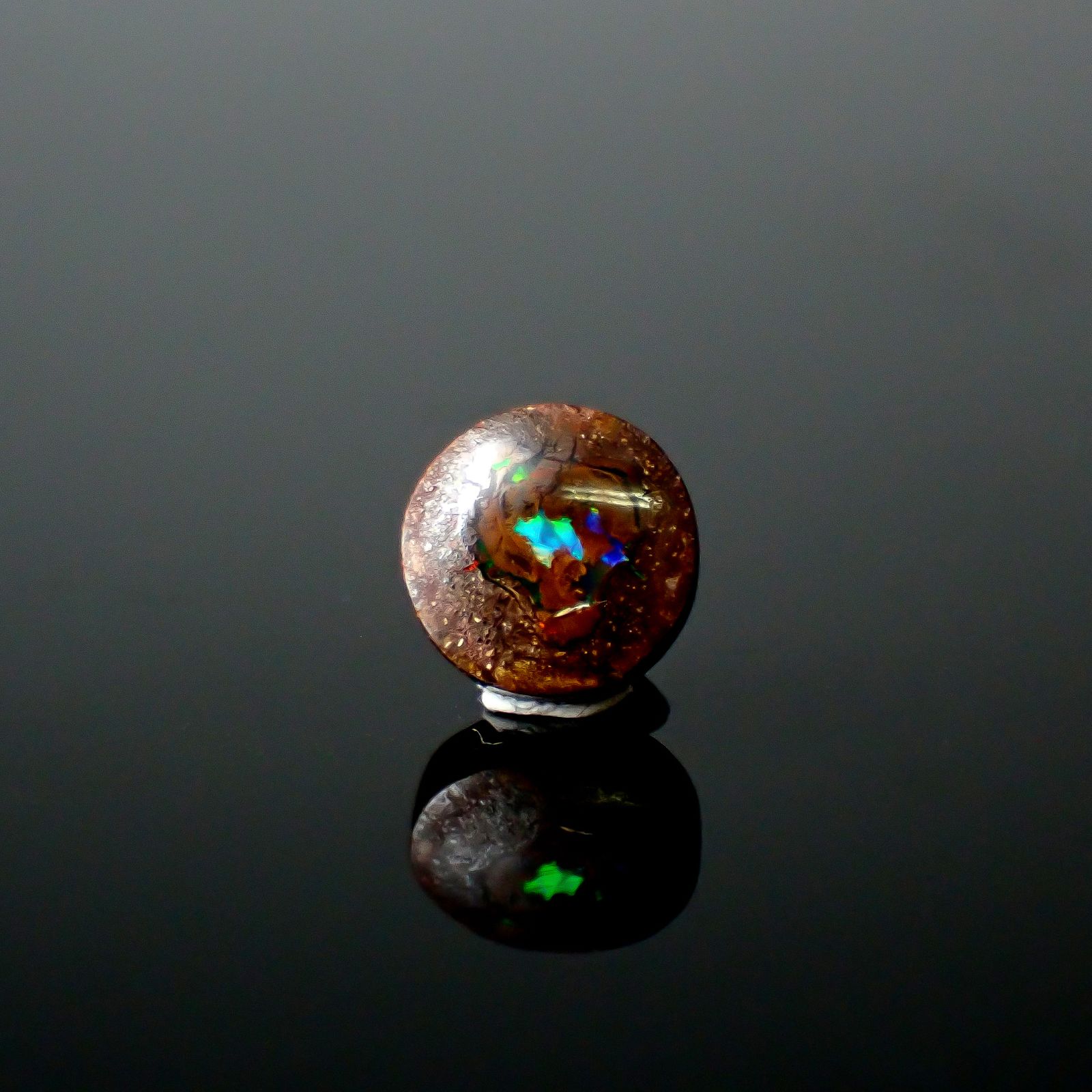 ウッドオパール オーストラリア産 0.89ct / 6.6x6.5mm前後 [251131294]