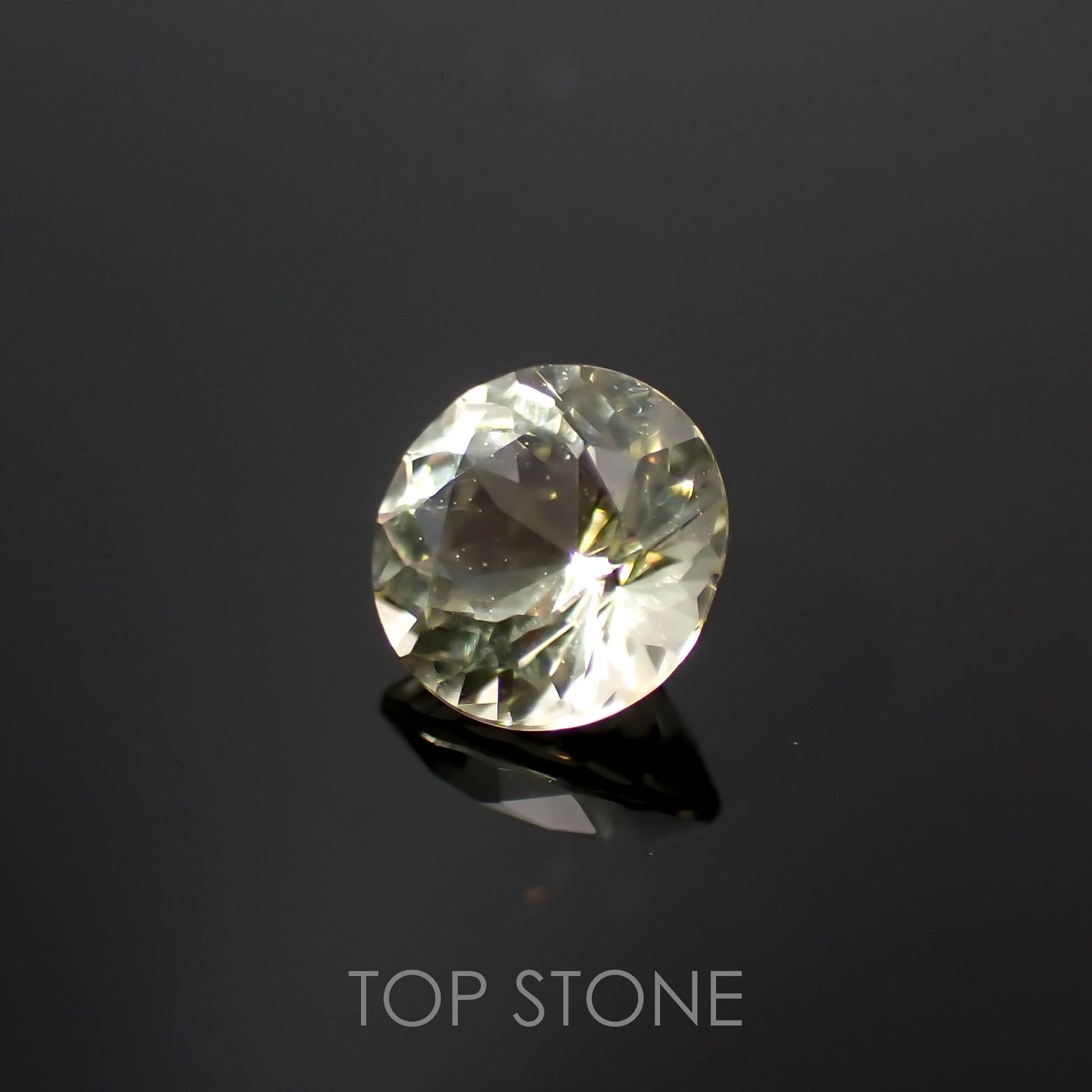 イエロースキャポライト(宝石名イエロー・スキャポライト)タンザニア産 0.43ct 識別済[221219401]5x5mm前後