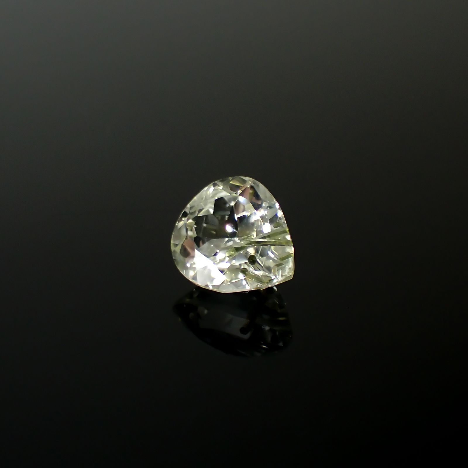 アパタイトイントパーズ(宝石名アパタイト イン トパーズ)ブラジル産 15.74ct 識別済[240225927]16.2x13.8mm前後