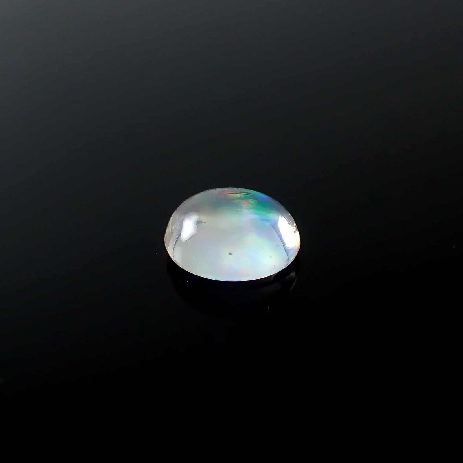 ウォーターオパール メキシコ産 0.49ct / 6x5.4mm前後 [250931004]