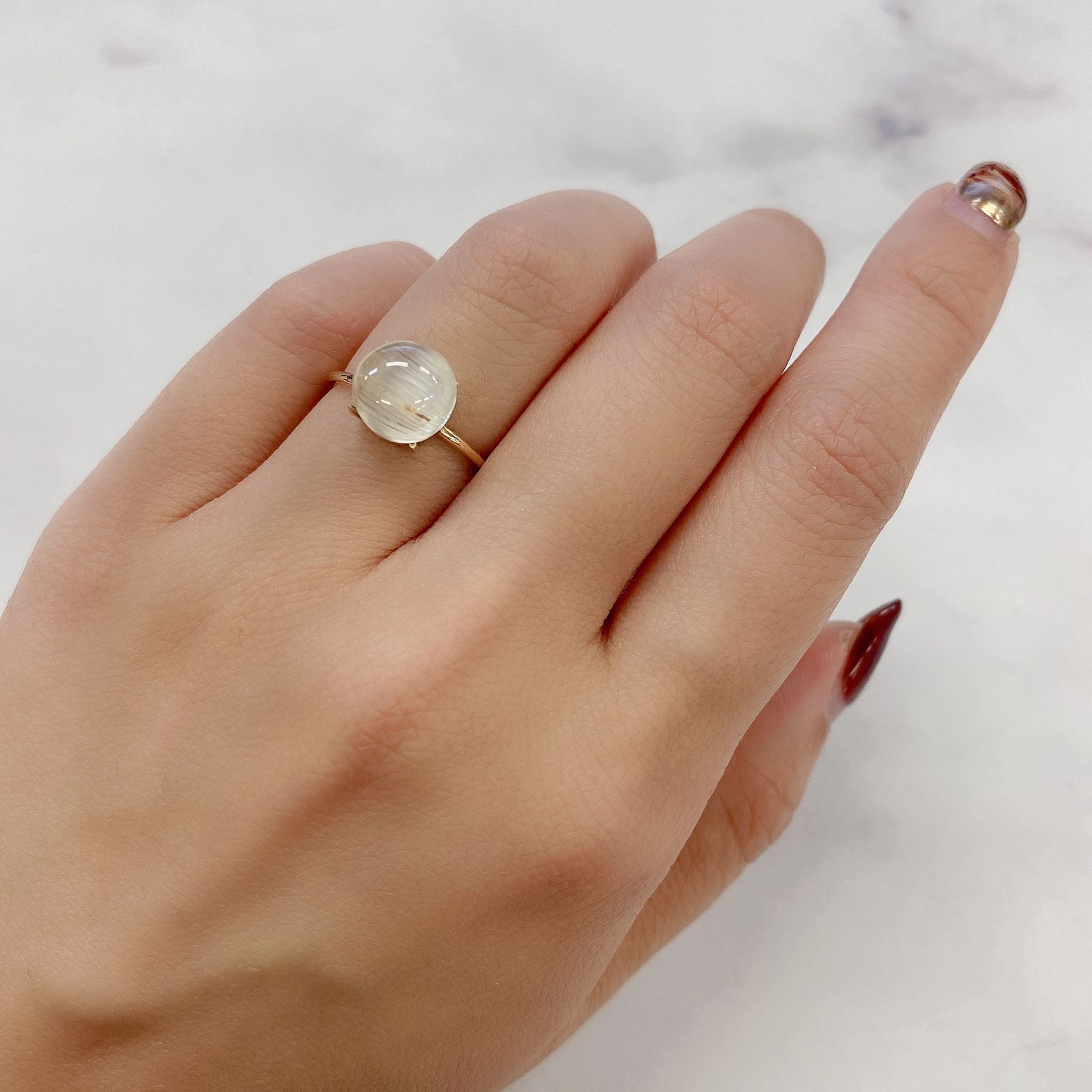 トパーズキャッツアイ(宝石名トパーズ・キャッツアイ)ビルマ産 5.198ct ソ付(彩珠)[220717090]9.1x9mm前後