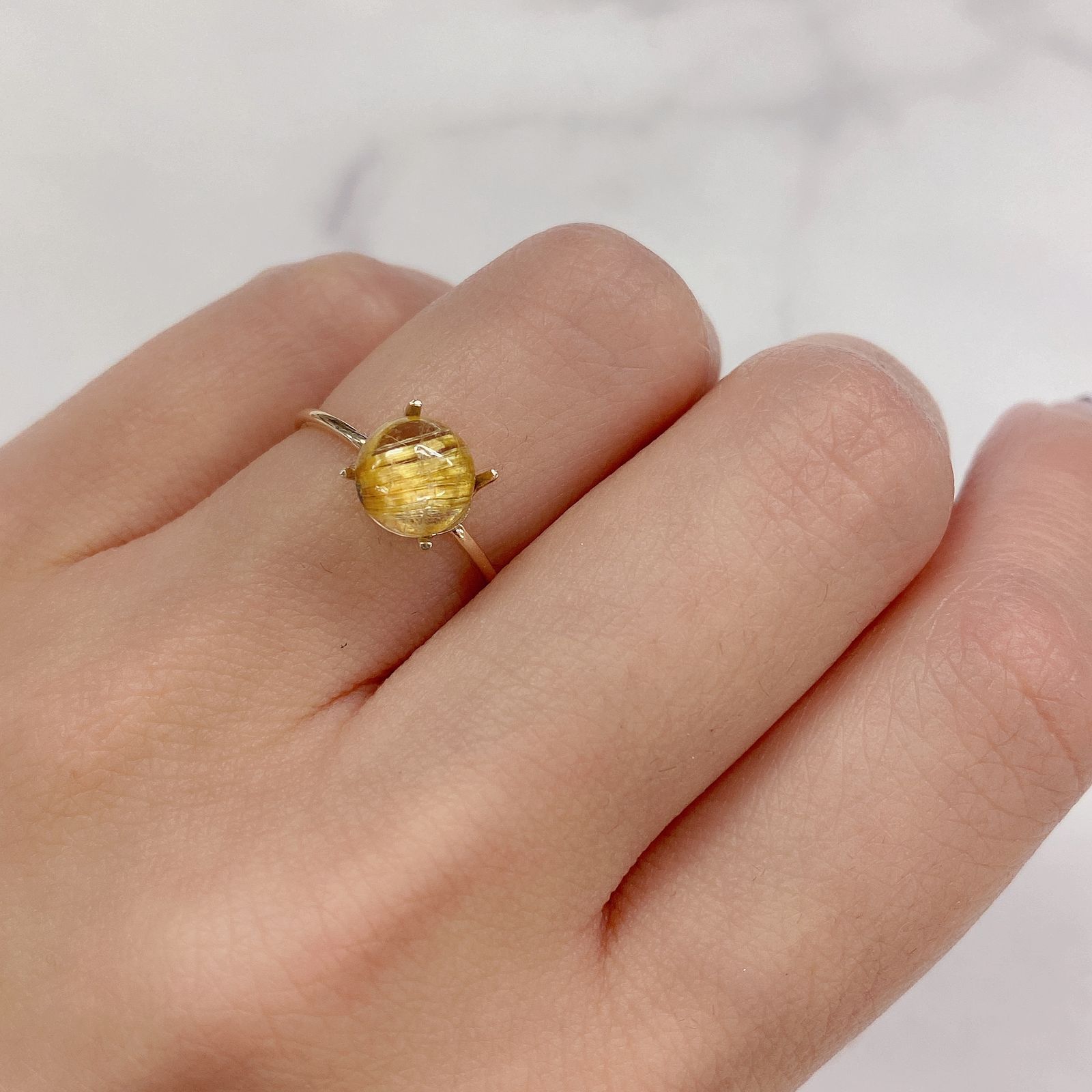 ルチルクォーツ(宝石名ルチルレイテッド・クォーツ) ブラジル産 1.38ct 識別済[20084477]7.1×7.1mm前後