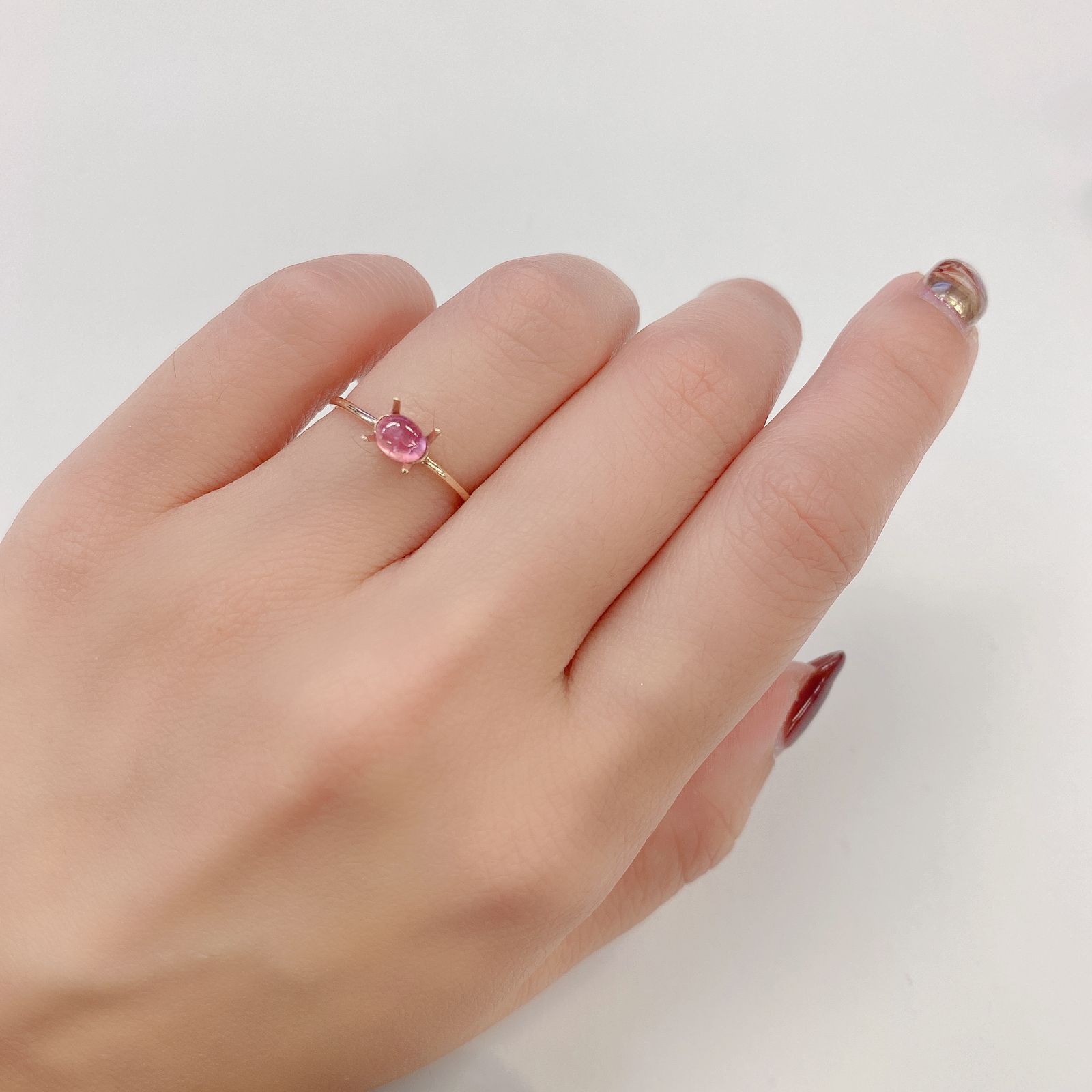 ペツォッタイトキャッツアイ(ラズベリル)(宝石名ペツォッタイト・キャッツアイ) マダガスカル産 0.457ct ソ付(彩珠)[210811972]4.6×3.9mm前後