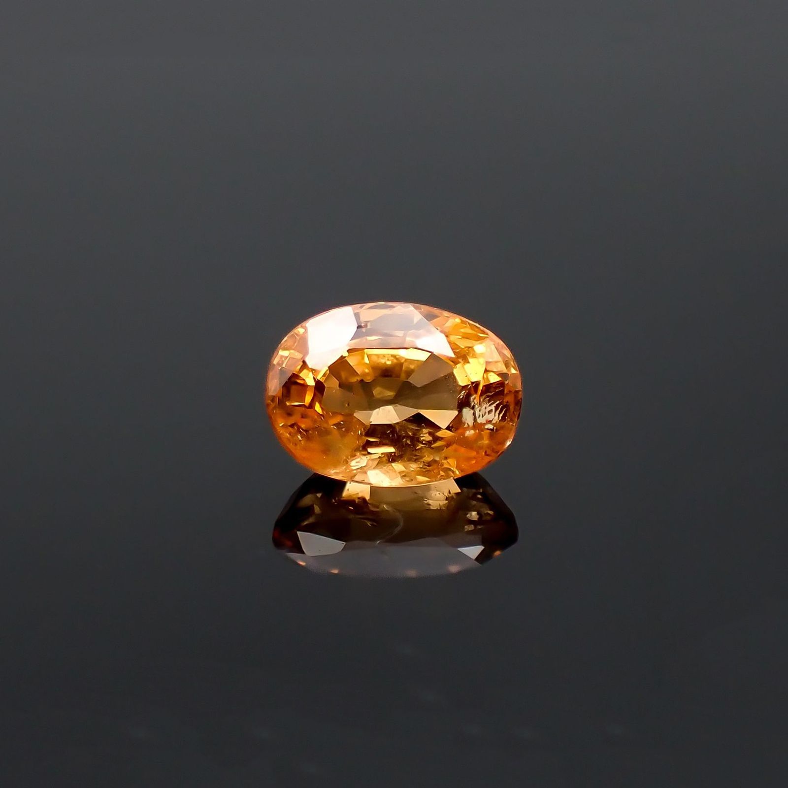 スペサルティンガーネット マンダリンオレンジカラー(宝石名ガーネット)ナイジェリア産 識別済 1.32ct / 7x5.1mm前後 [260623388]