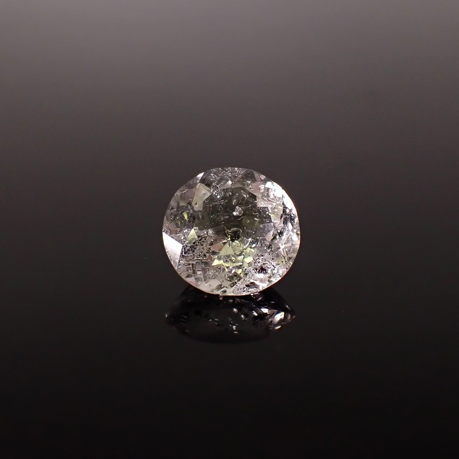 グラファイトインクォーツ ブラジル産 6.27ct / 12.4x12.1mm前後 [260331937]