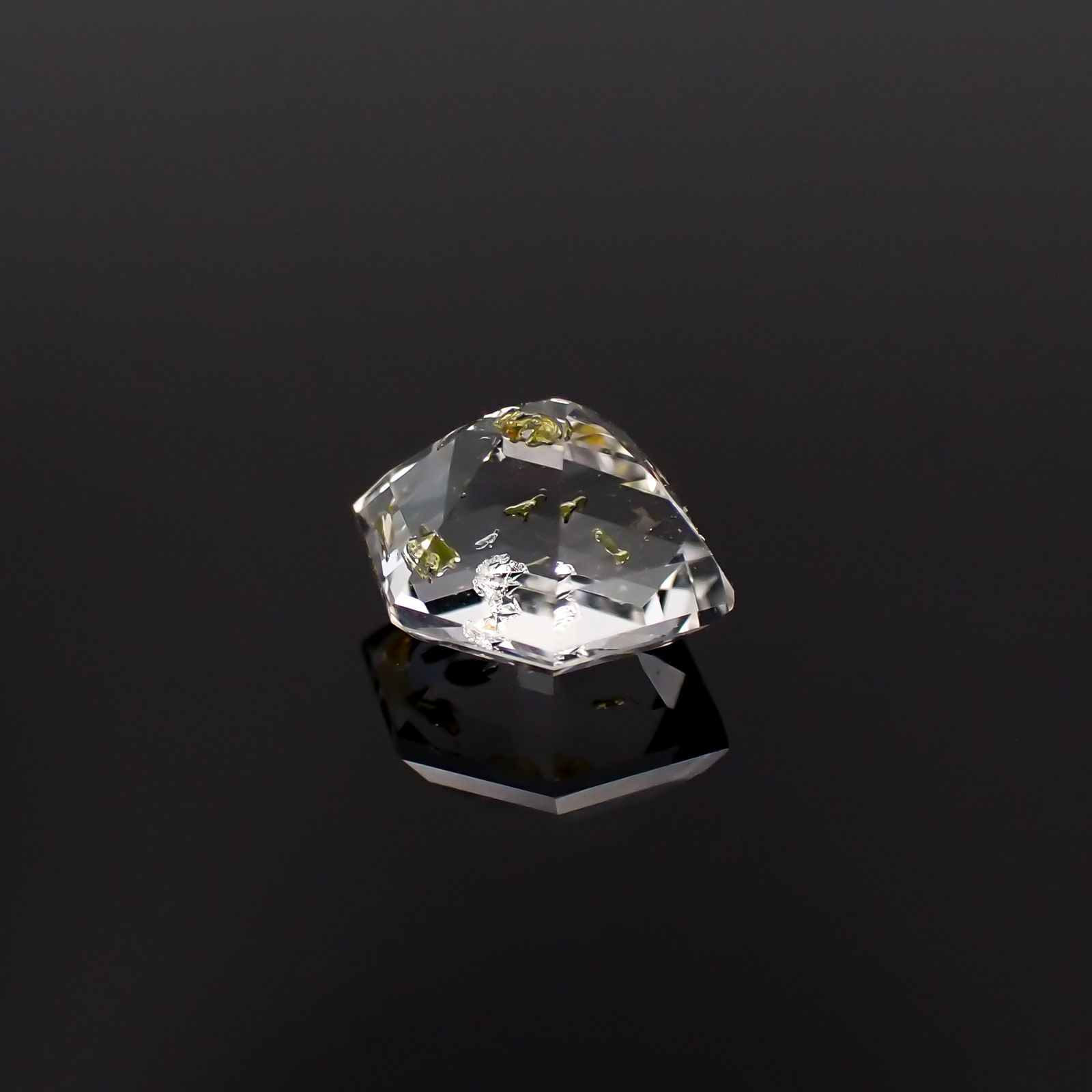 ◇カスタムカット◇オイルインクォーツ パキスタン産 0.64ct [230522096]6.6x4.7mm前後