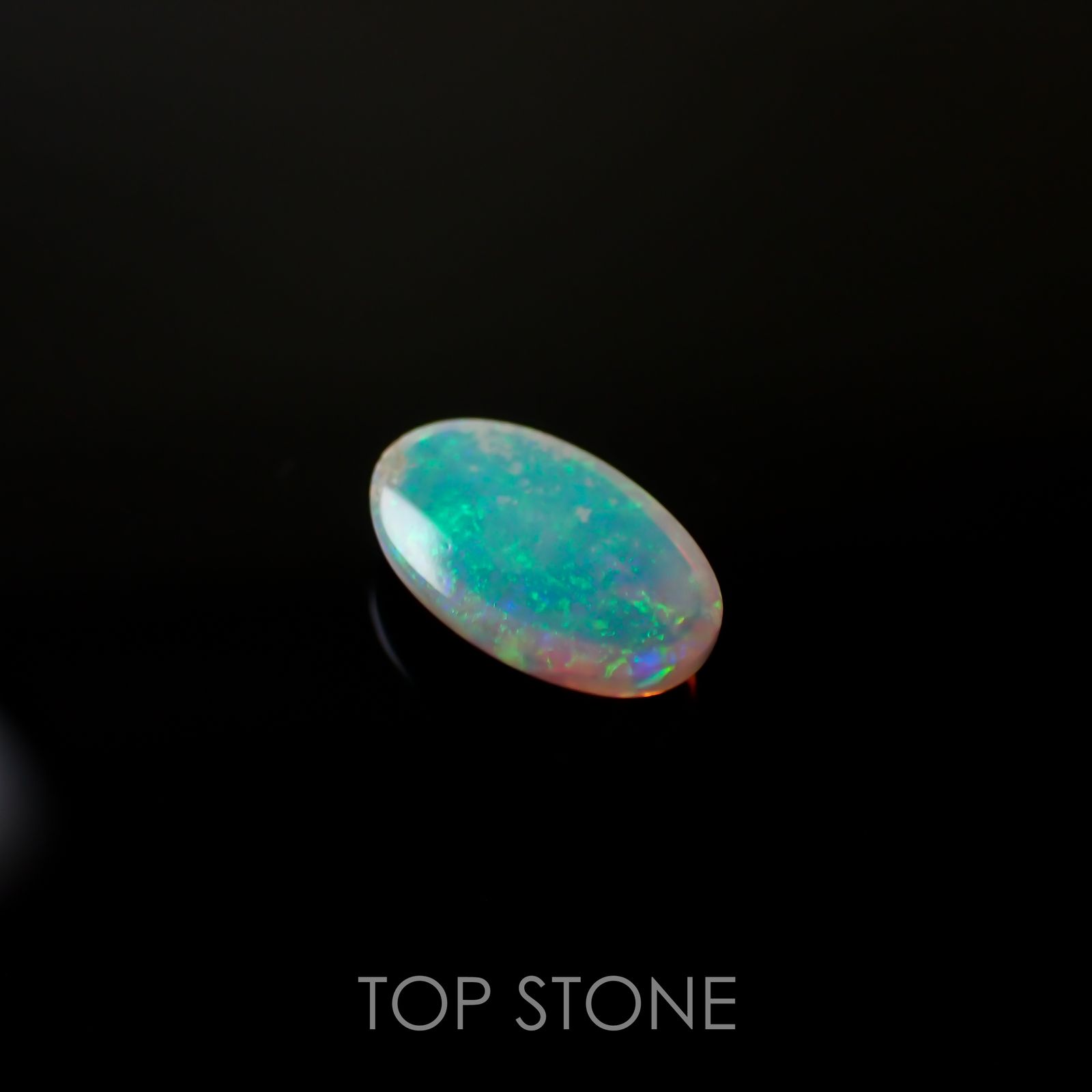 オパール(宝石名ホワイト・オパール) オーストラリア産 1.122ct ソ付(彩珠)[210711336]10.2×6.4mm前後