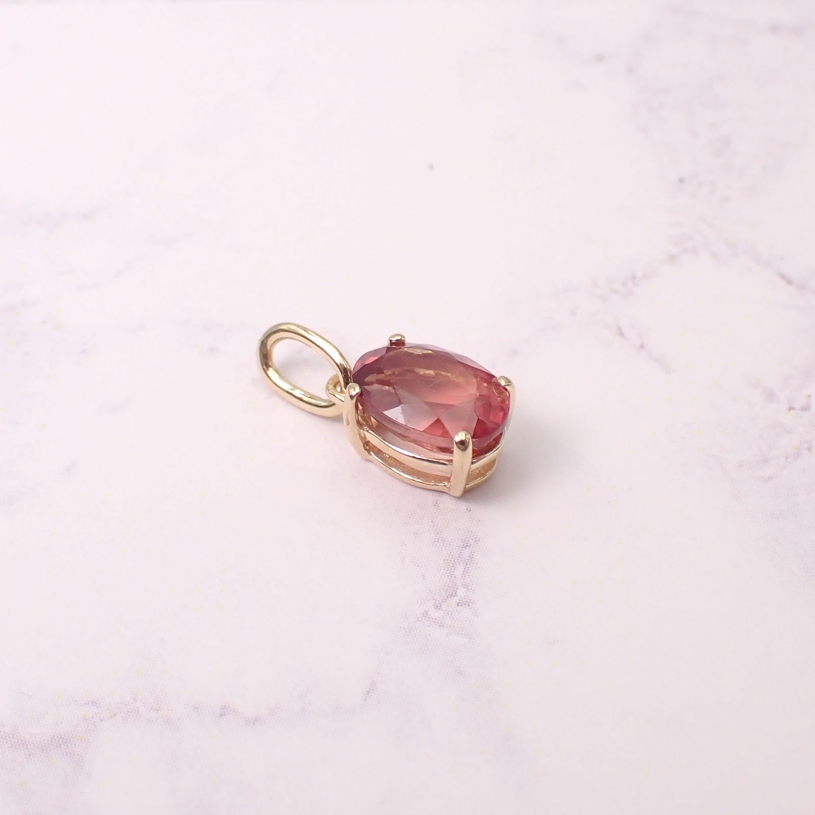 ペンダント空枠：石留め▶オレゴンサンストーン（お客様製作例）