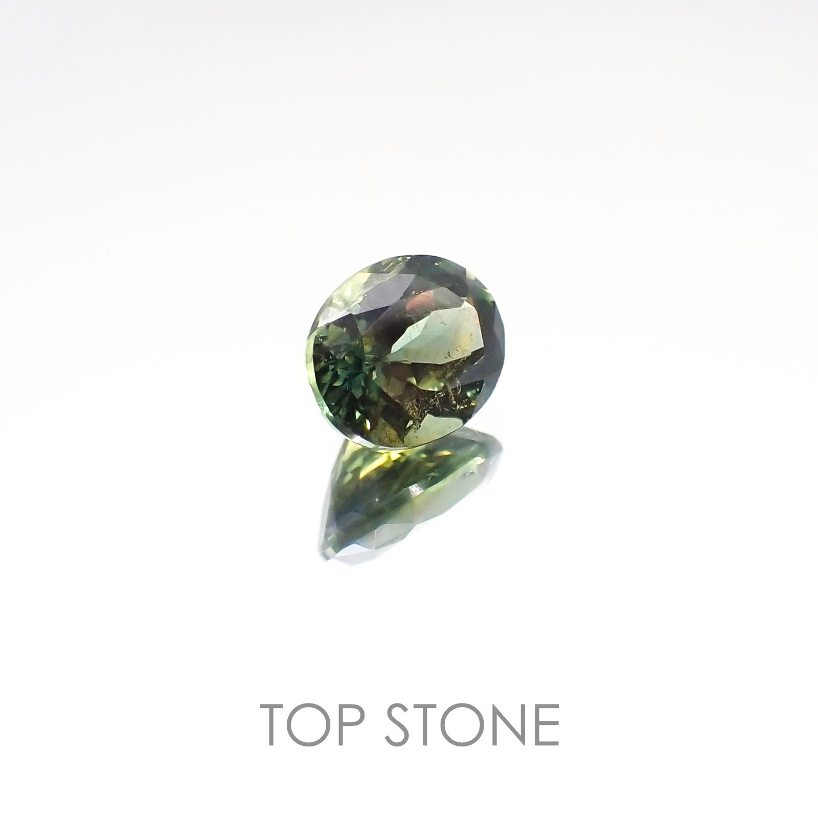 ゴールドシーンサファイア 非加熱(宝石名シーン・サファイア) ケニア産 0.797ct ソ付(彩珠)[20117120]6×4.7mm前後