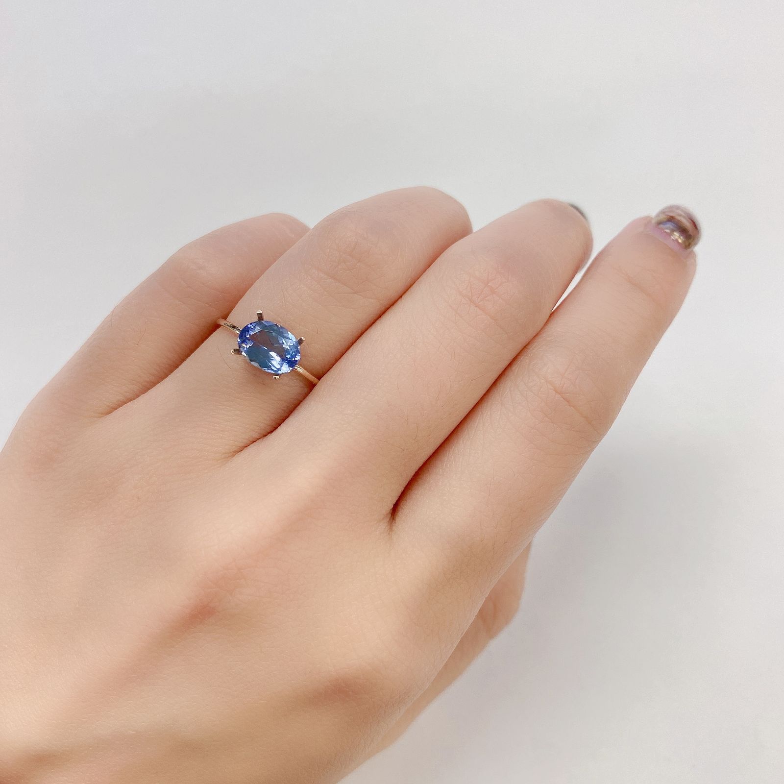 バイカラータンザナイト(宝石名タンザナイト) タンザニア産 1.544ct ソ付(彩珠)[210711819]8.1×6mm前後