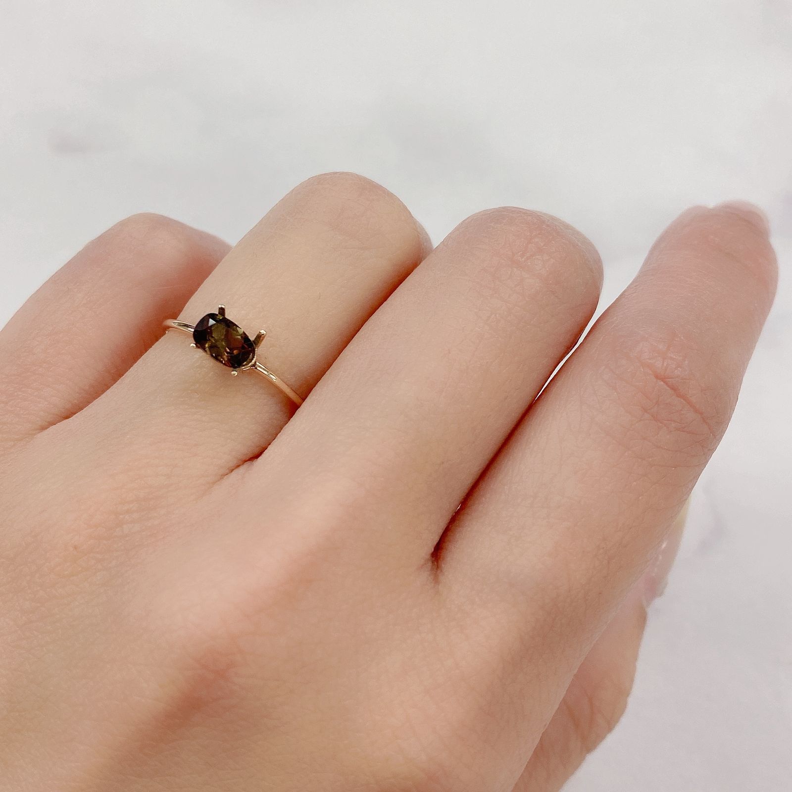 アキシナイト(宝石名アキシナイト) ロシア産 0.49ct 識別済[20063162]4.2×5.8mm前後