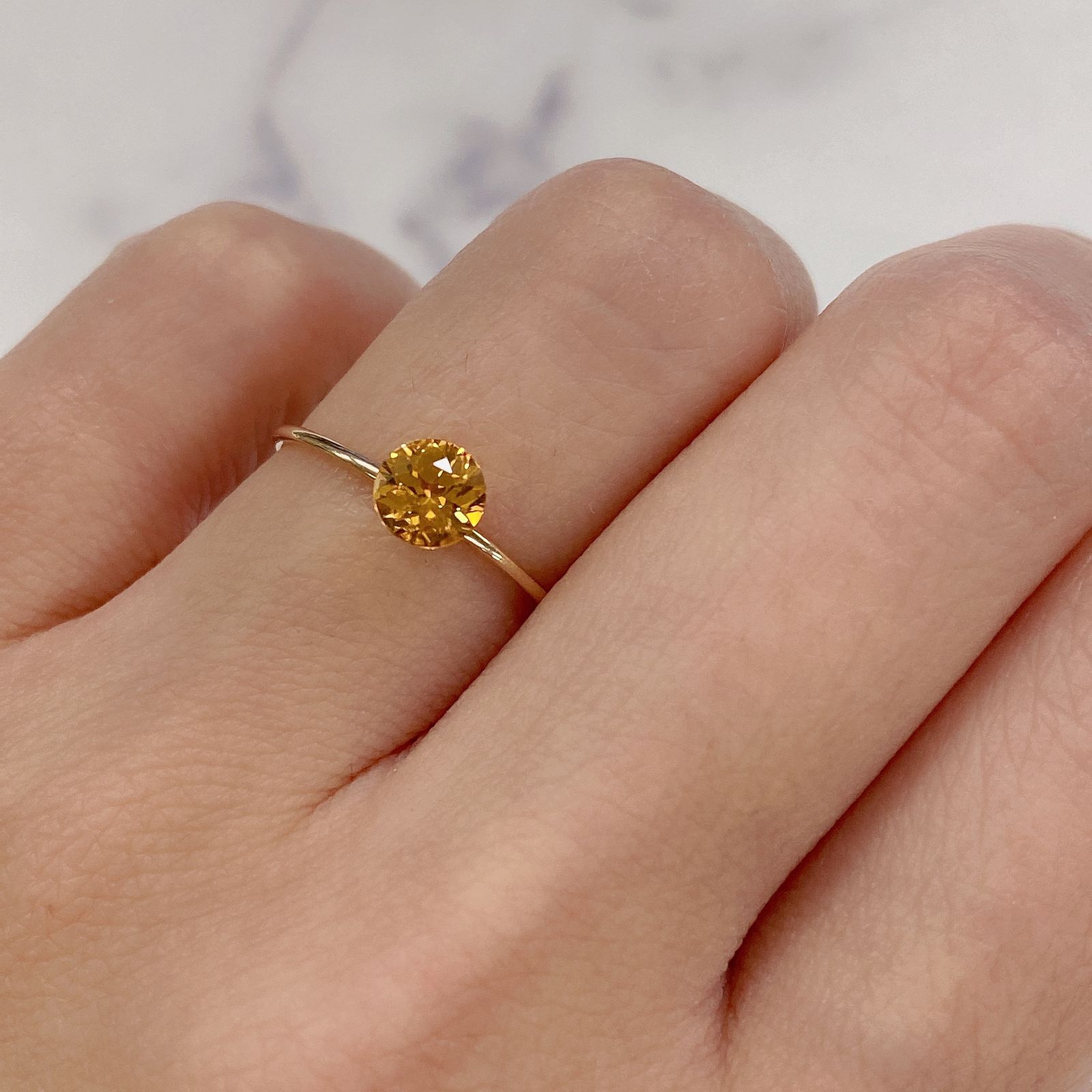 スペサルティンガーネット マンダリンオレンジカラー(宝石名スペサルティン・ガーネット) ケニア産 0.69ct 識別済[20118101]5.4×5.4mm前後
