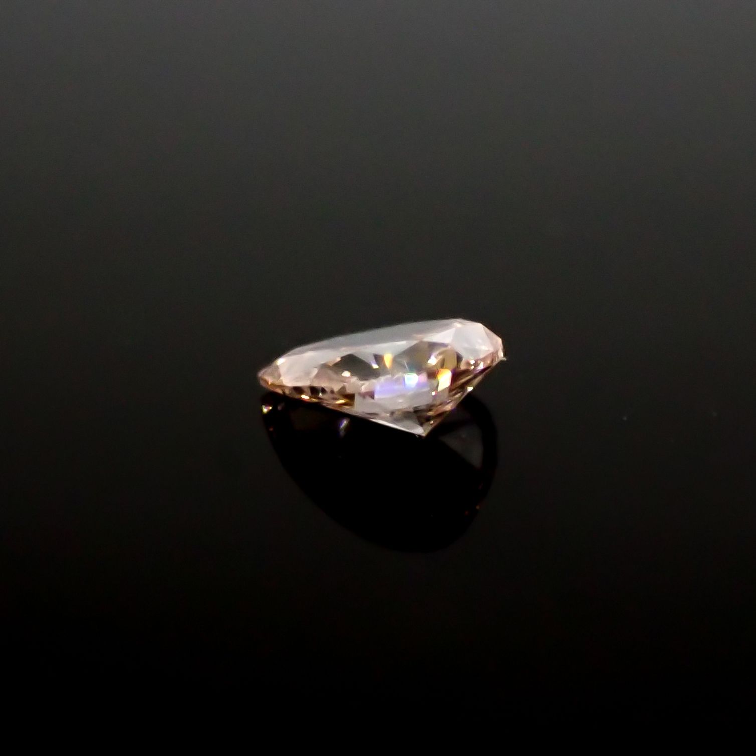 ピンクダイヤモンド(宝石名ダイアモンド SI-1/FANCY BROWNISH ORANGY PINK) 0.097ct ソ付(CGL)[240928974]3.6x2.81mm前後